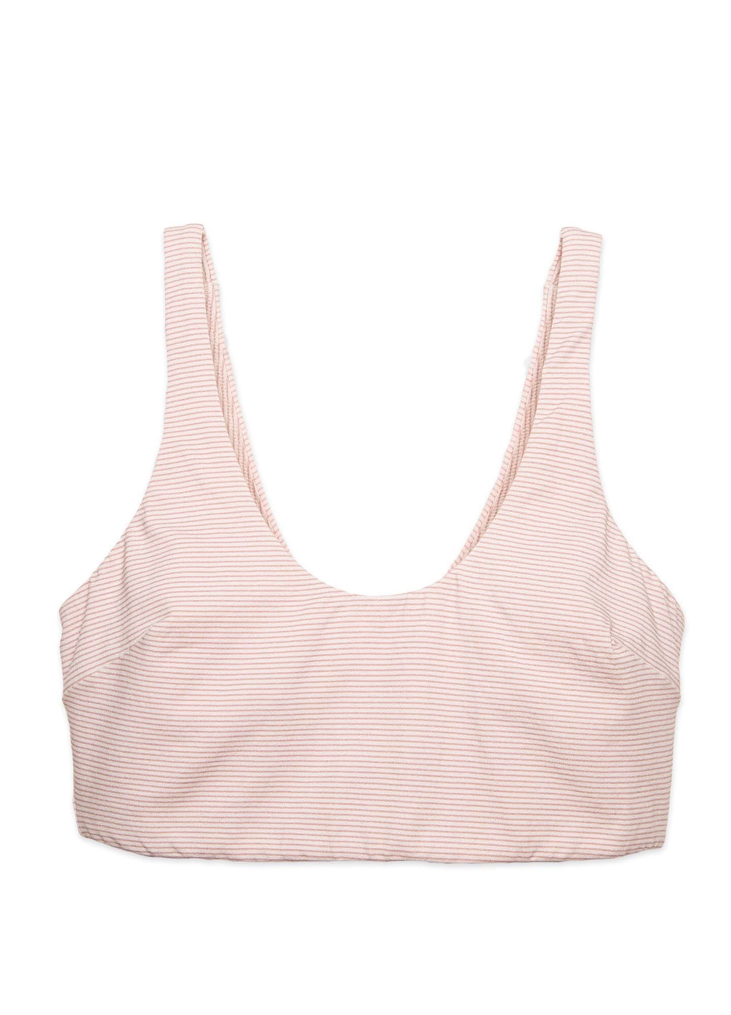 Soft pink maternity bra with wide straps and a seamless, supportive design.