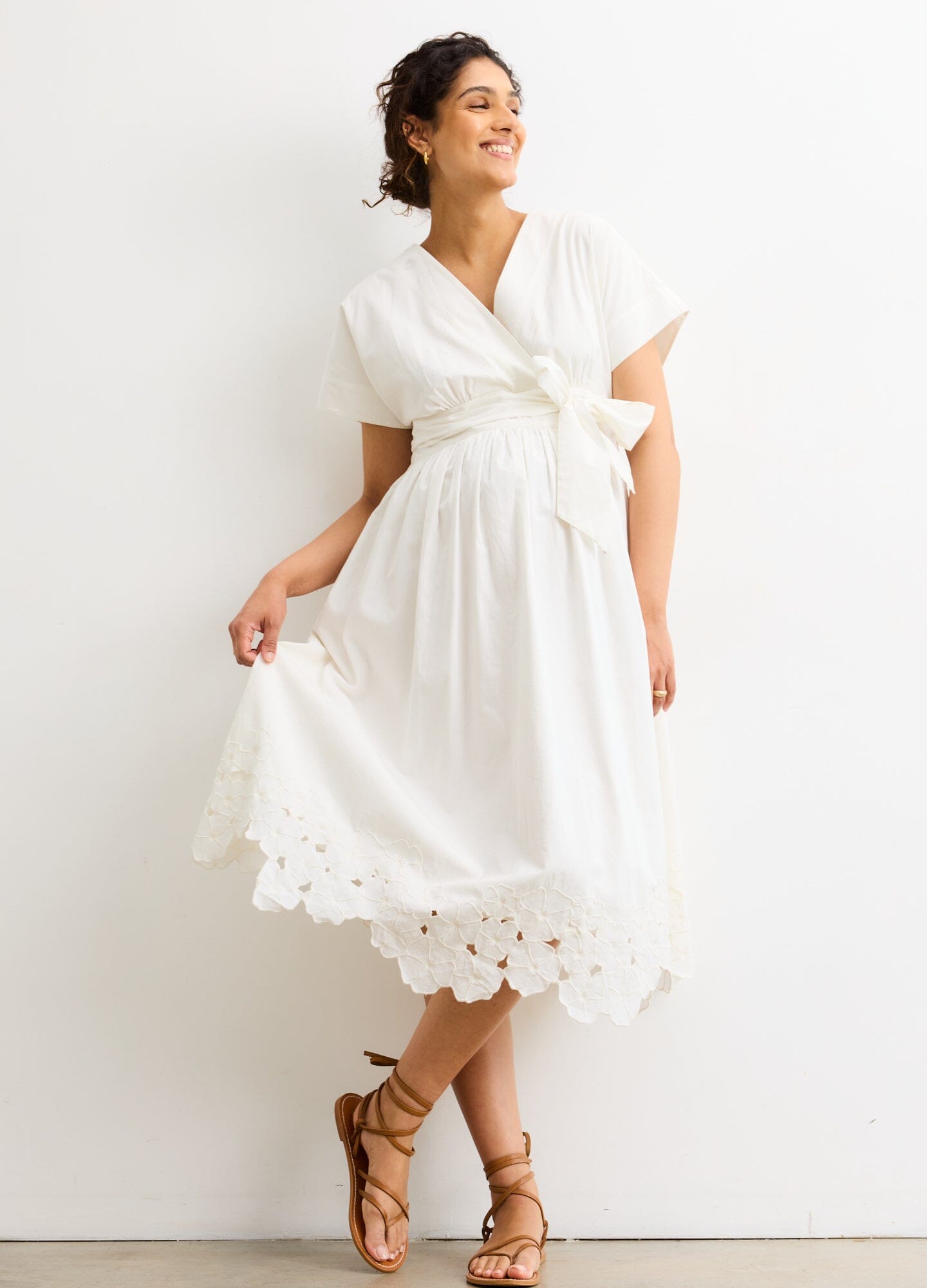 The Floral Embroidered Carolina Dress - White cotton poplin maternity dress with floral embroidery and scalloped hem, designed for pregnancy, nursing, and.