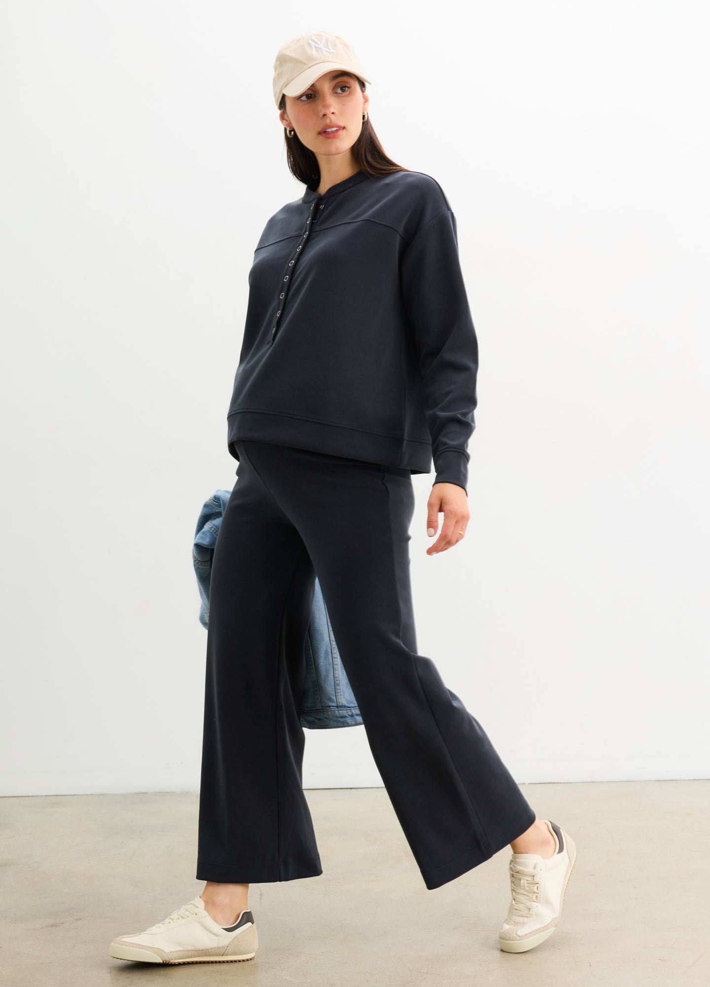 The Cloudease Travel Over Under Pant - Black maternity travel pants with relaxed fit and soft fabric, styled for pregnancy, nursing, and postpartum comfort.