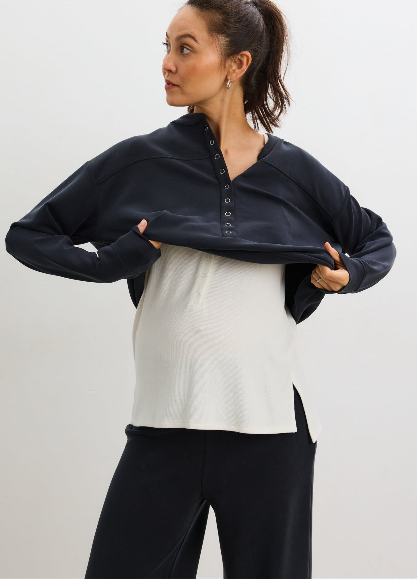 The Cloudease Travel Nursing Pullover - Women's washed black maternity pullover with relaxed fit, side nursing access, and matching wide-leg pants.