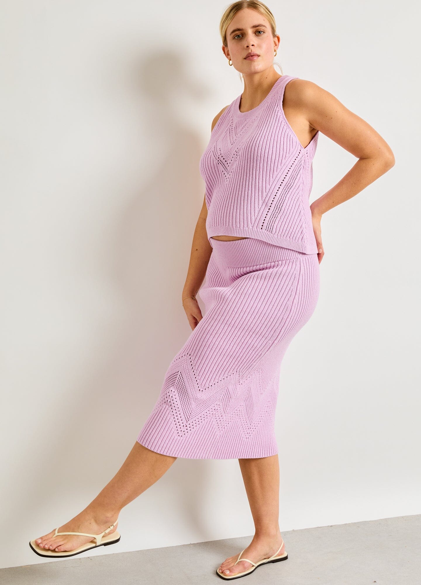 The Delphine Cotton Pointelle Skirt - Pink lilac cotton pointelle maternity skirt with a chevron pattern and soft stretch for pregnancy and postpartum wear.