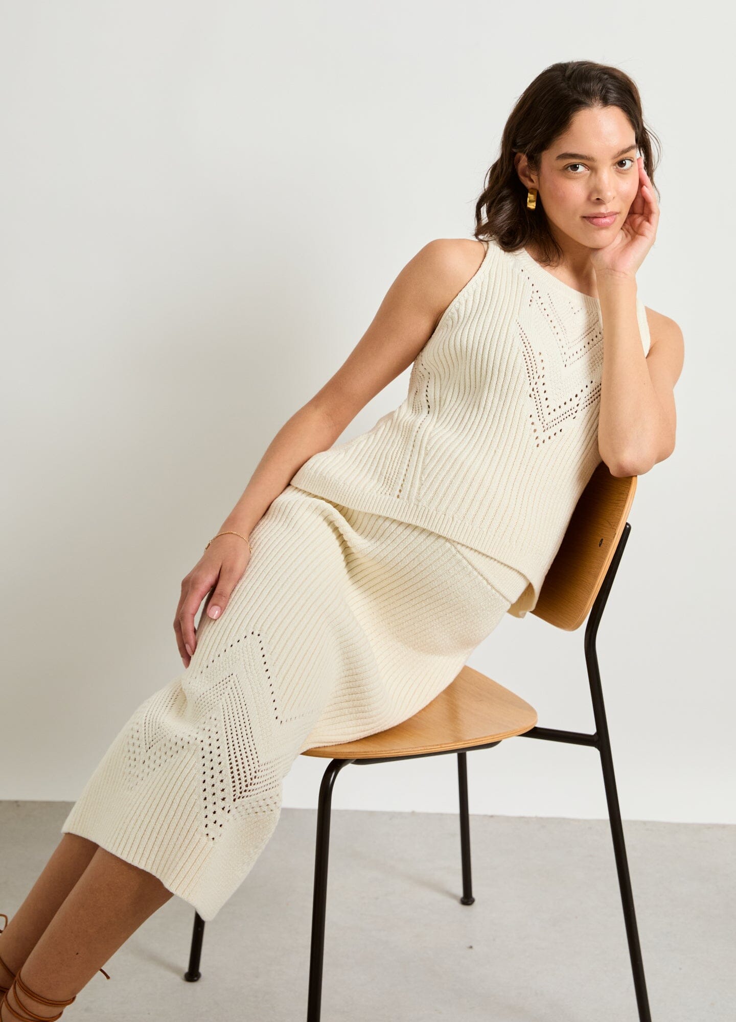 The Delphine Cotton Pointelle Skirt - Vanilla cotton pointelle maternity skirt with delicate knit pattern, designed for pregnancy, nursing, and postpartum wear.