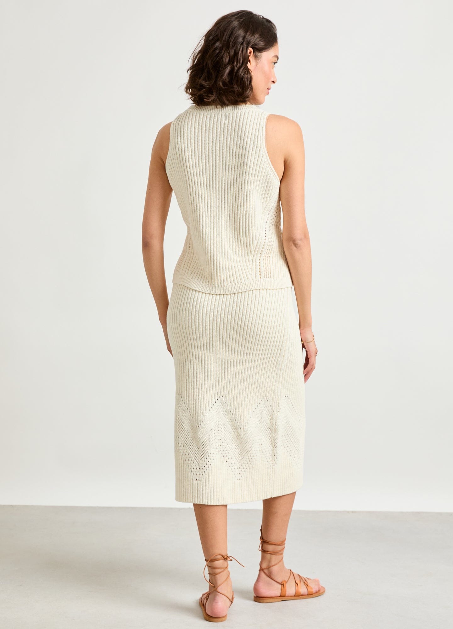 The Delphine Cotton Pointelle Skirt - Vanilla cotton pointelle maternity skirt with delicate knit pattern, designed for pregnancy, nursing, and postpartum wear.