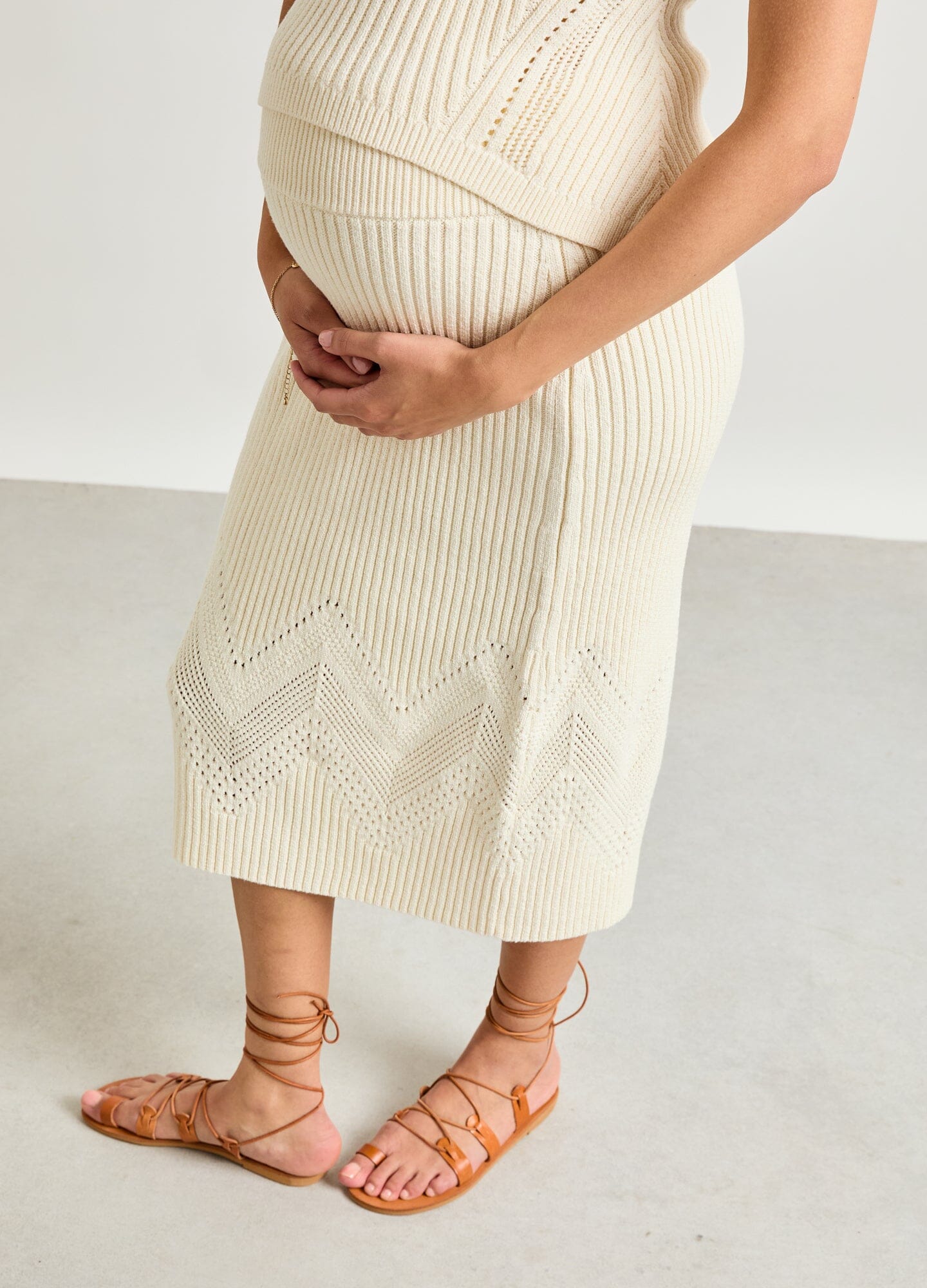 The Delphine Cotton Pointelle Skirt - Vanilla cotton pointelle maternity skirt with delicate knit pattern, designed for pregnancy, nursing, and postpartum wear.