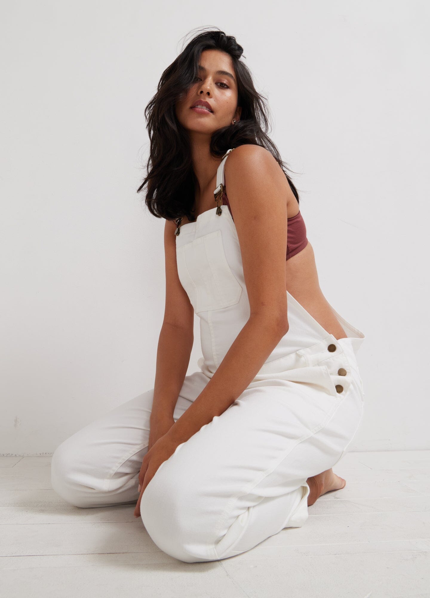 The Denim Maternity Overall - True white denim maternity overall with adjustable straps, square neckline, and relaxed fit for pregnancy, nursing, and.