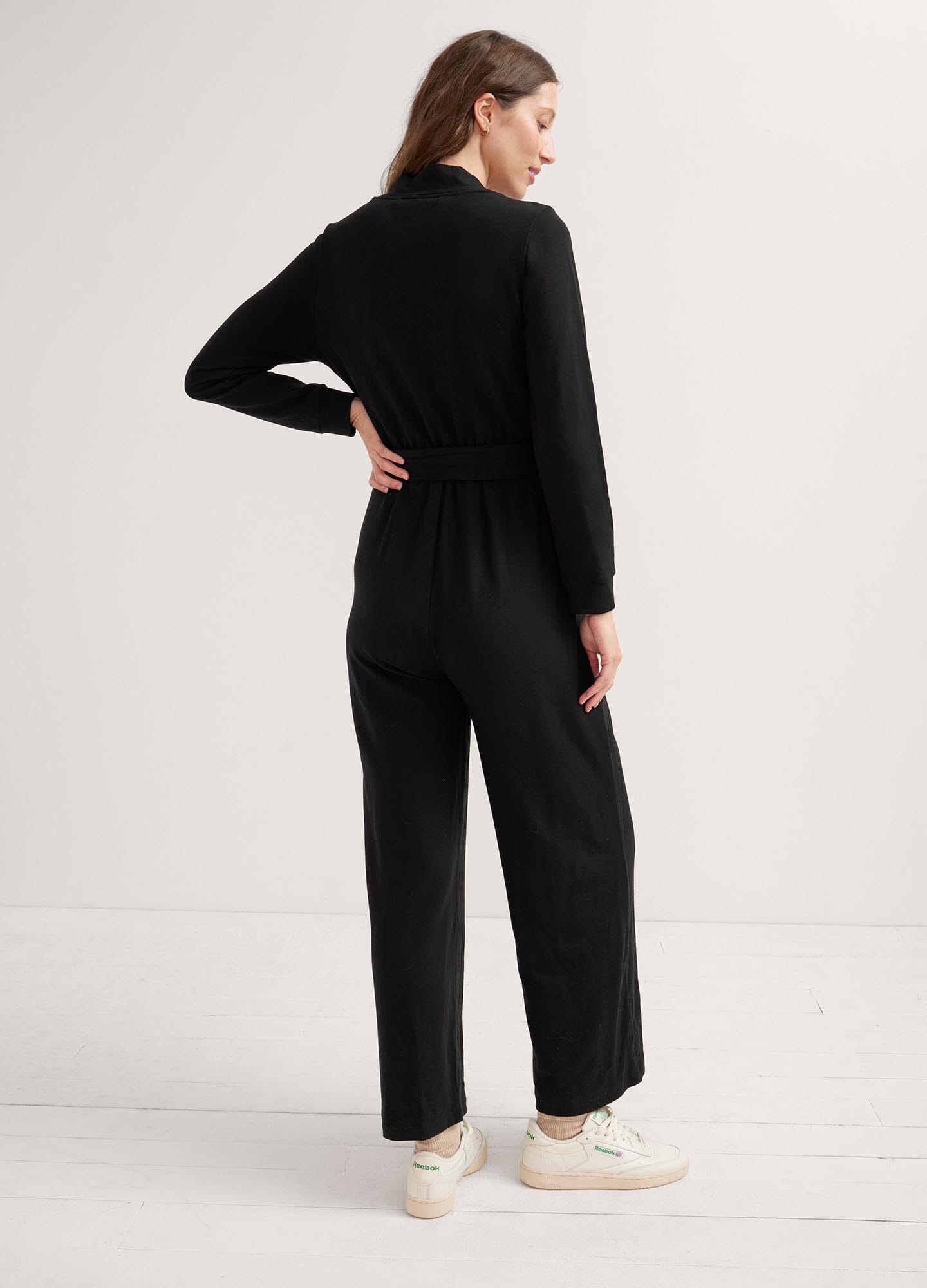 The Easy Nursing Jumpsuit - Black maternity jumpsuit with long sleeves, nursing-friendly front zipper, and relaxed wide-leg fit for postpartum comfort.