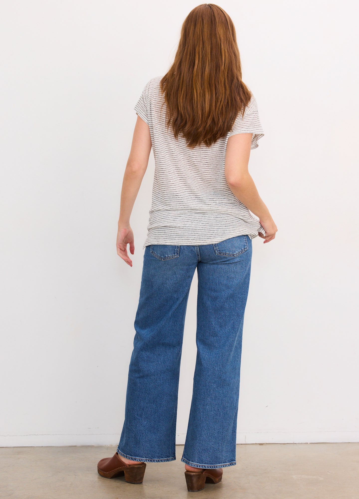 Light grey short-sleeve maternity linen tee with a relaxed fit and curved hem.