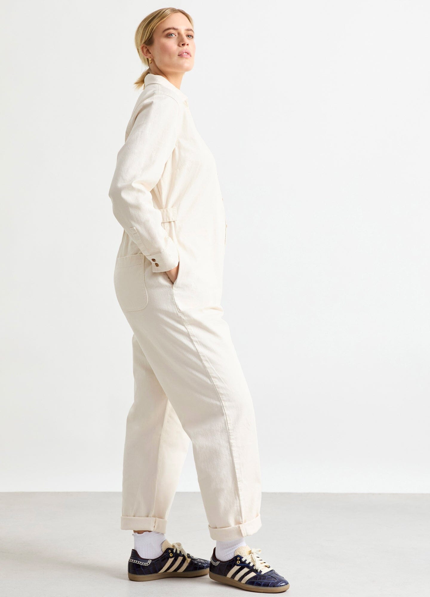 The Everyday Nursing Denim Jumpsuit - Vanilla maternity denim jumpsuit with button-front nursing access, relaxed fit for pregnancy and postpartum.