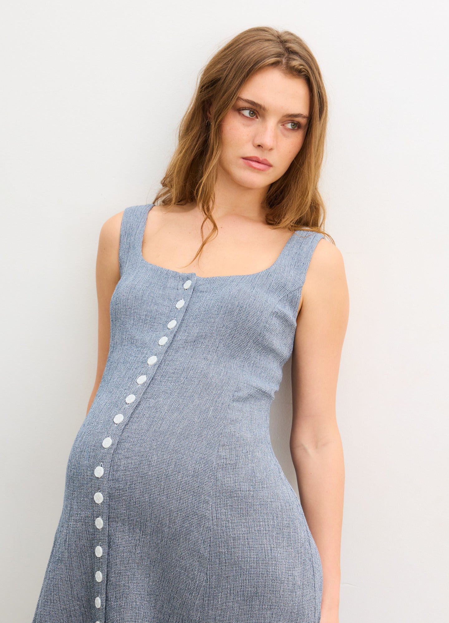 The Felicity Dress - Navy button-front maternity dress with sleeveless design for nursing and postpartum comfort.