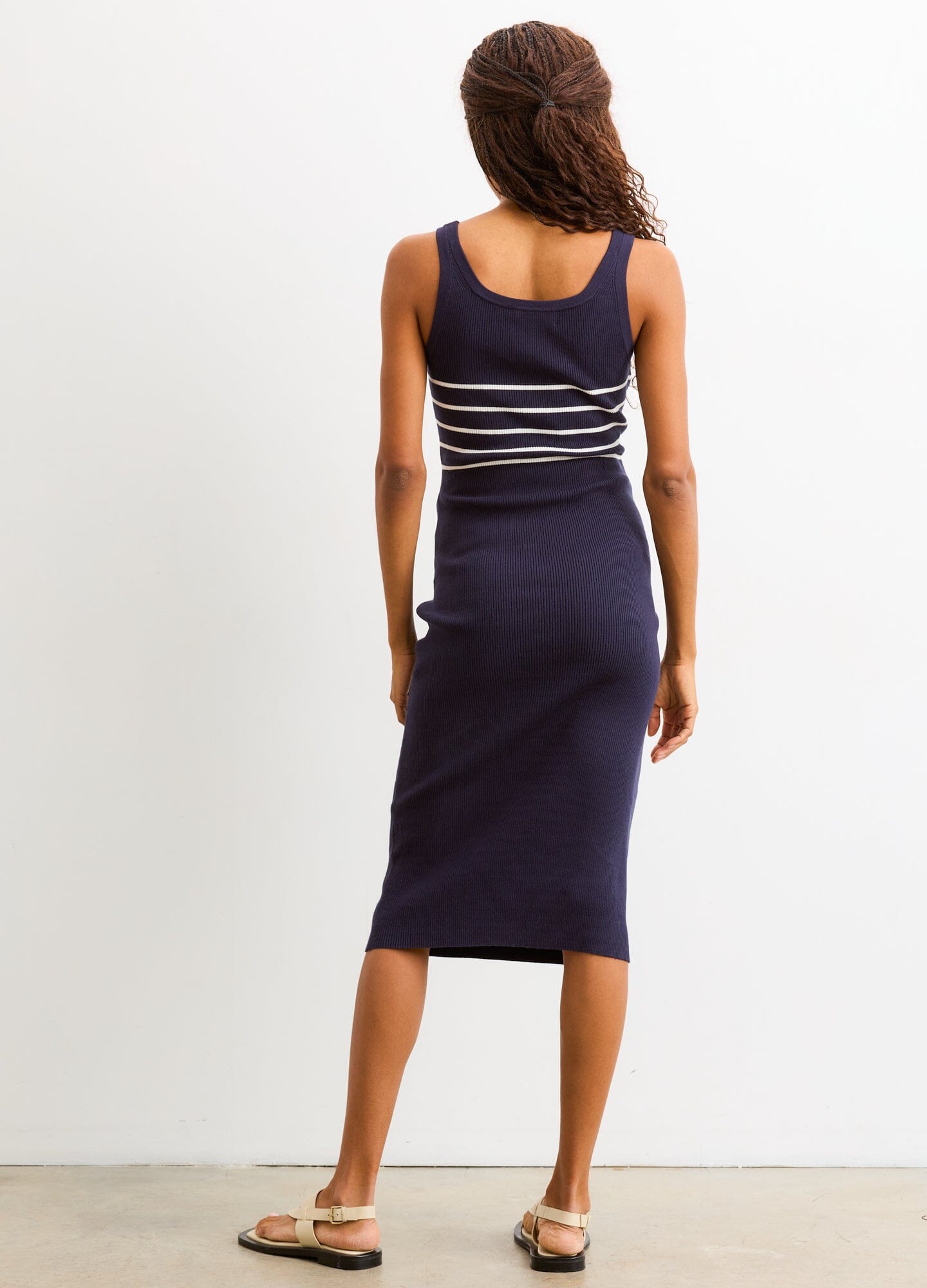 The Kristen Ribbed Knit Tank Dress - Navy and white striped ribbed knit tank dress with scoop neckline, designed for maternity, nursing, and postpartum.