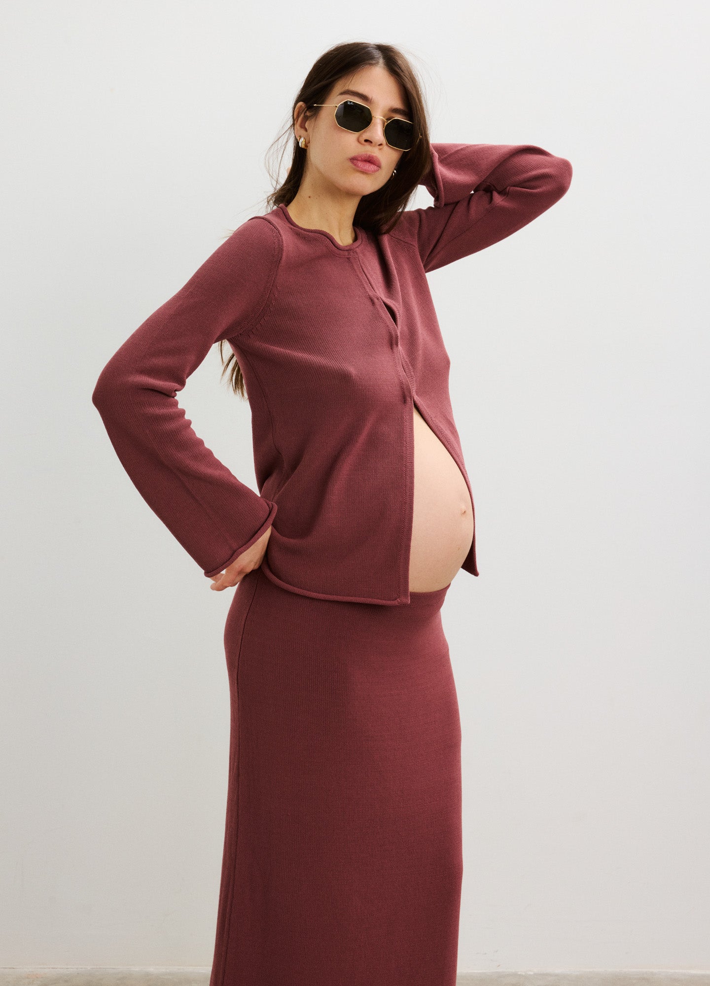 Mauve maternity skirt set with long-sleeve buttoned top and fitted maxi skirt, soft knit fabric.