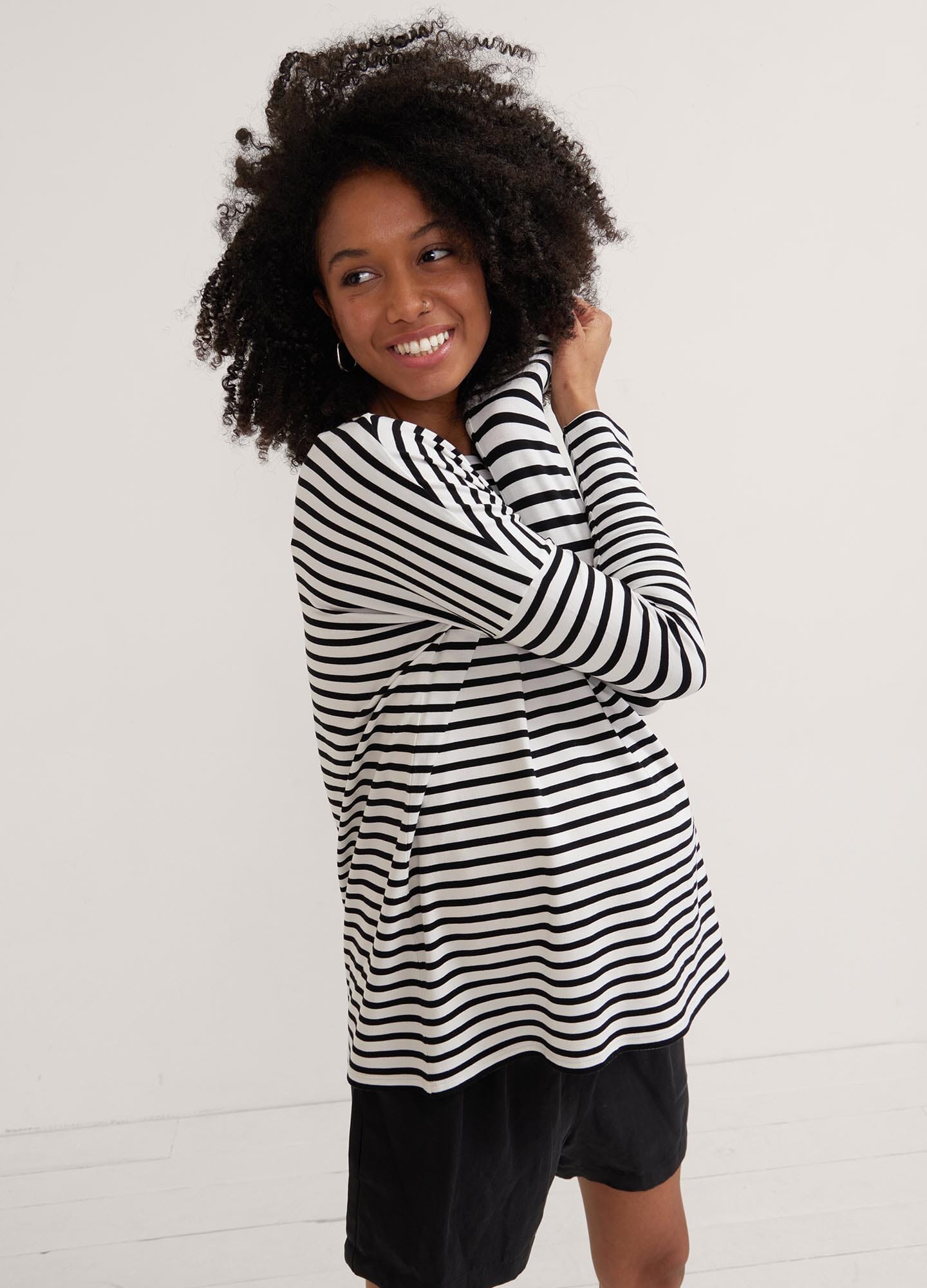 The Perfect Longsleeve Tee - Black and white striped maternity long sleeve tee with relaxed fit and round neckline, designed for pregnancy, nursing, and.