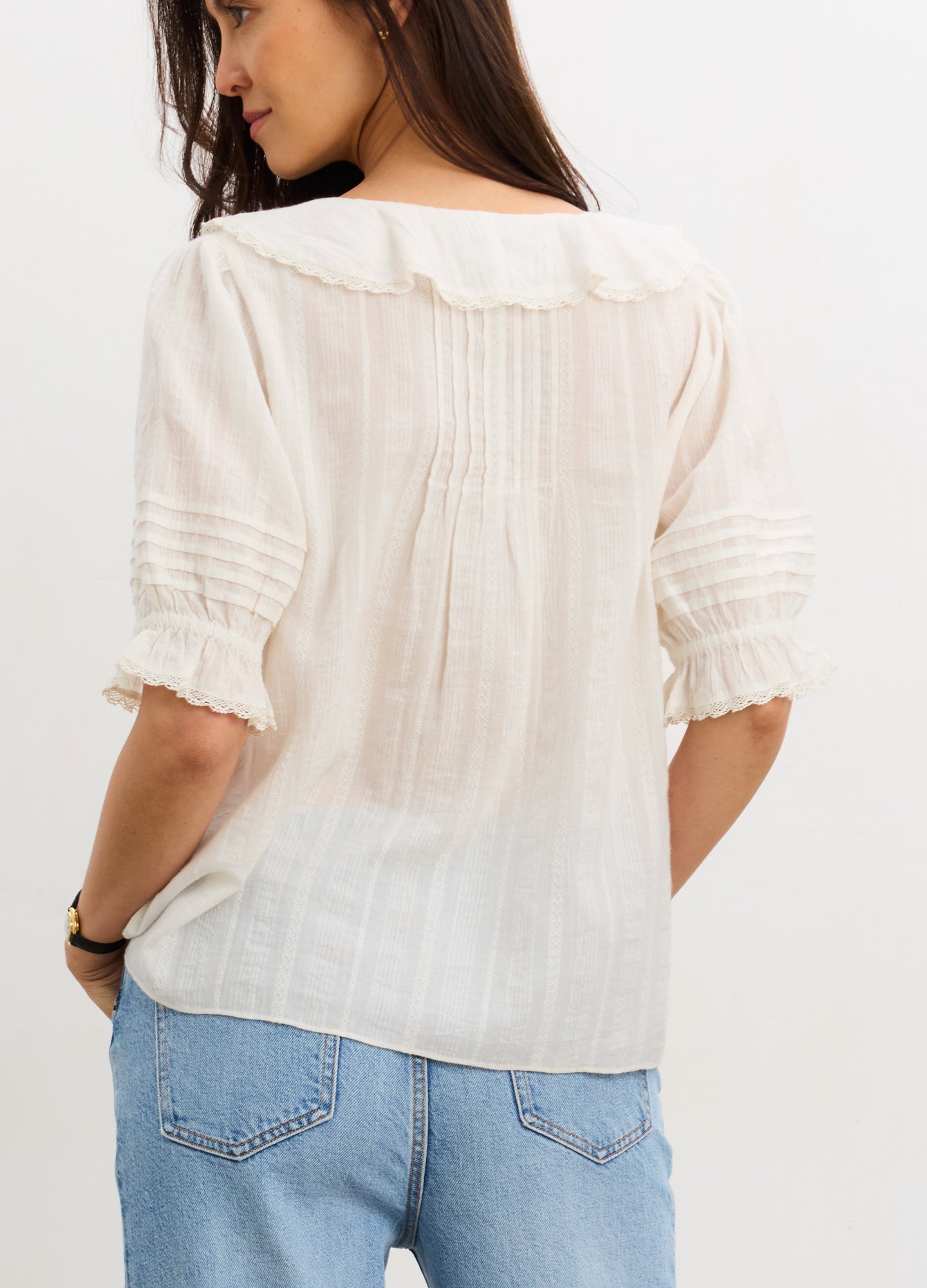 The Lou Lou Nursing Blouse - Vanilla maternity nursing blouse with button front and delicate ruffle trim, designed for pregnancy and postpartum.