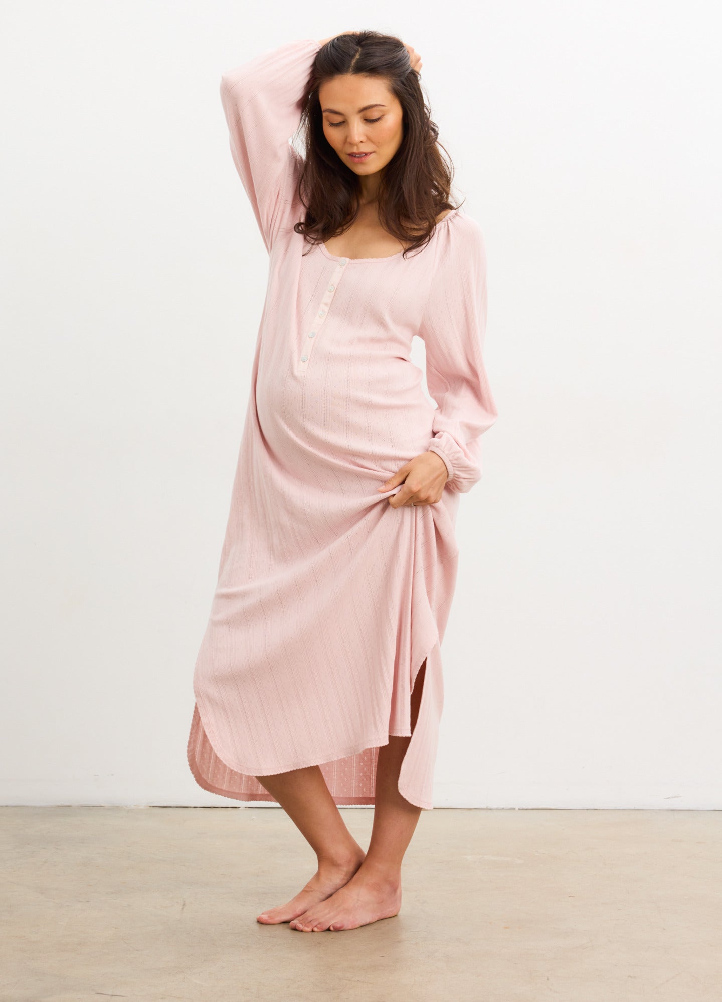 Soft pink long sleeve maternity nightgown with delicate pointelle knit and relaxed fit.