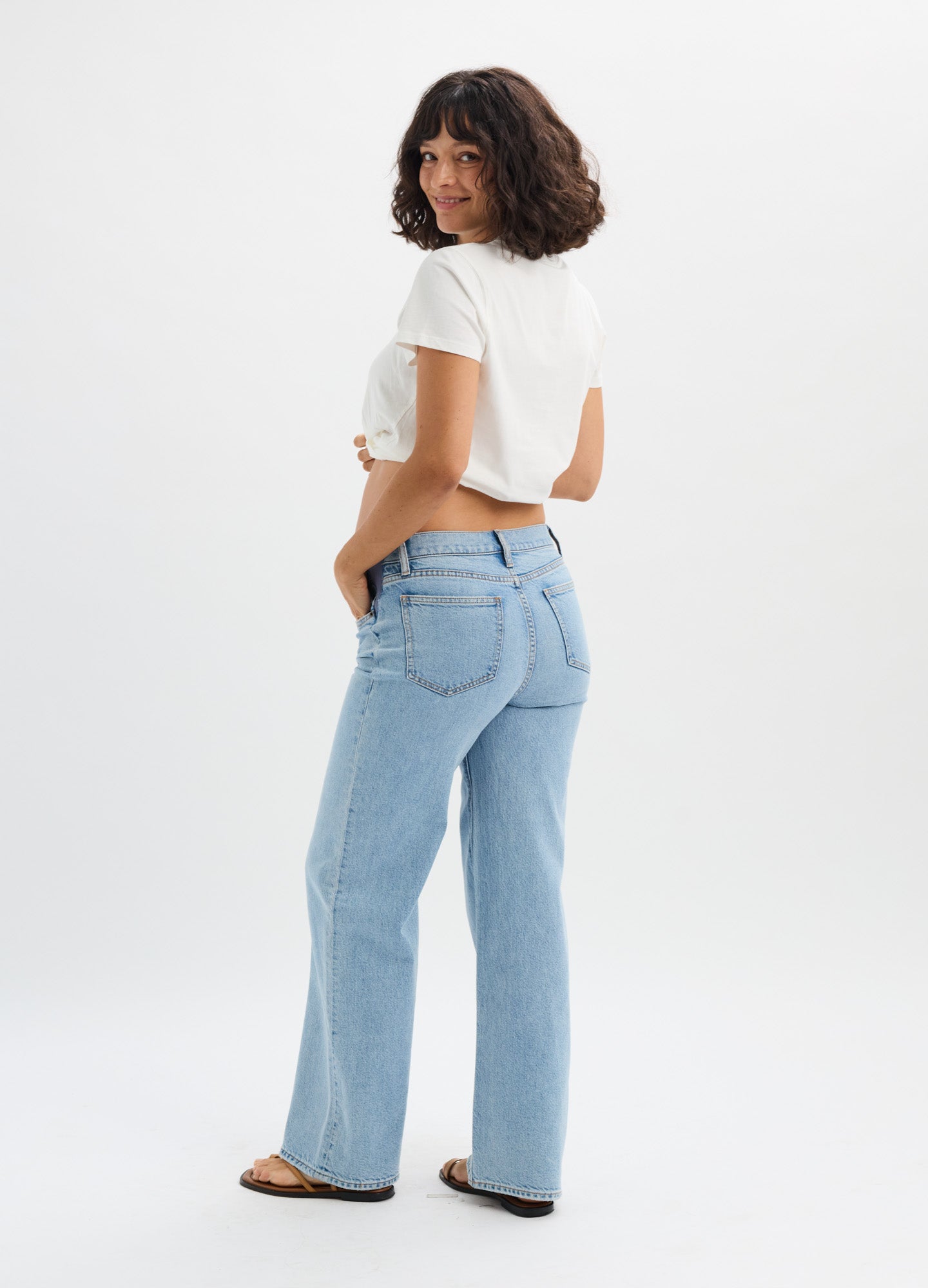 Light blue wide-leg maternity jeans with a relaxed fit and adjustable waistband.