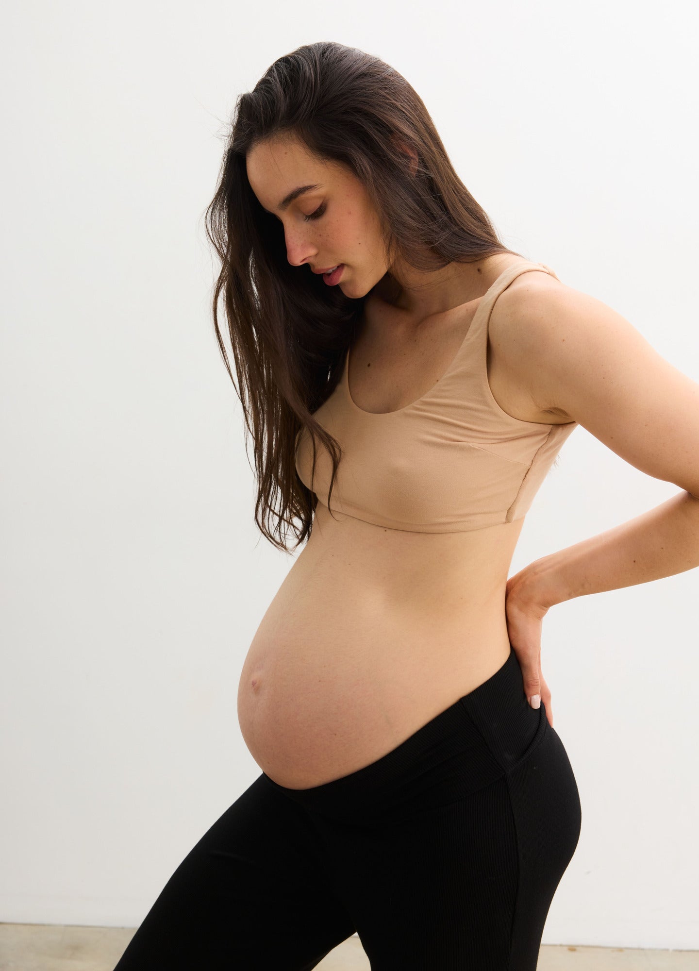 The Skin To Skin Bra - Sand-colored maternity bra with seamless design and wide straps, ideal for pregnancy, nursing, and postpartum.