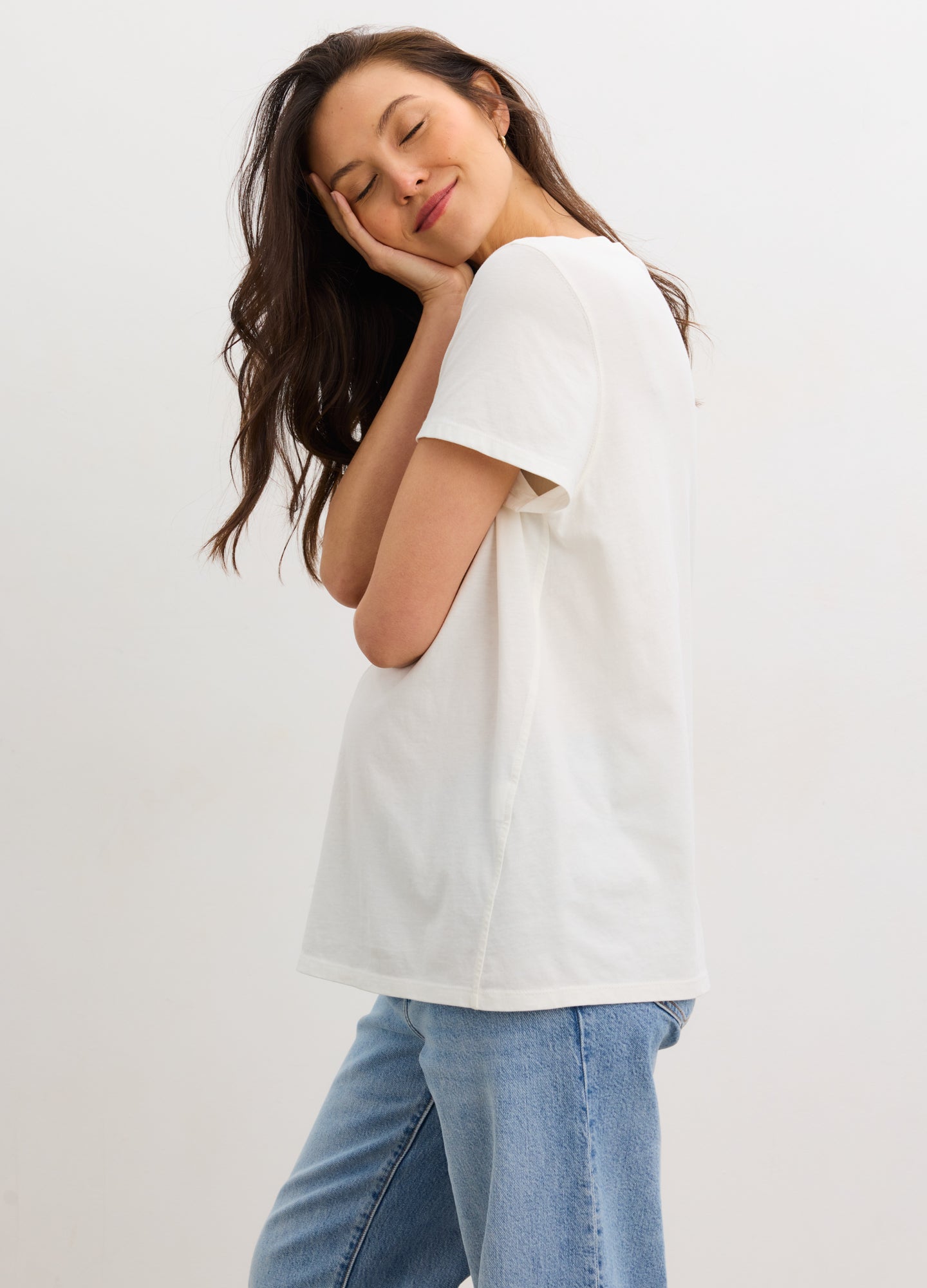 White washed cotton crew neck maternity t-shirt with short sleeves and relaxed fit.