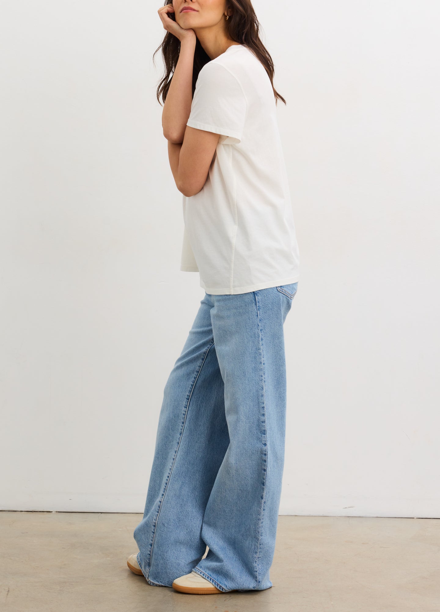 Soft white washed cotton crew neck t-shirt with short sleeves, relaxed fit, maternity-friendly design.