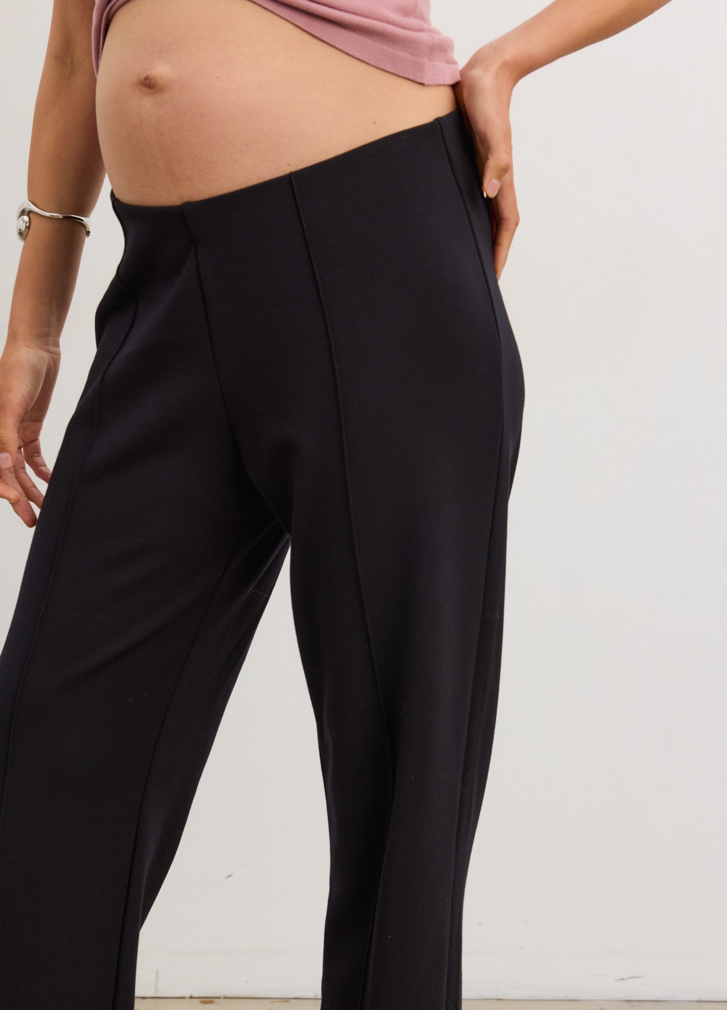 The Seamed Stretch Straight-Leg Work Pant - Black seamed stretch straight-leg maternity work pants designed for pregnancy, nursing, and postpartum comfort.