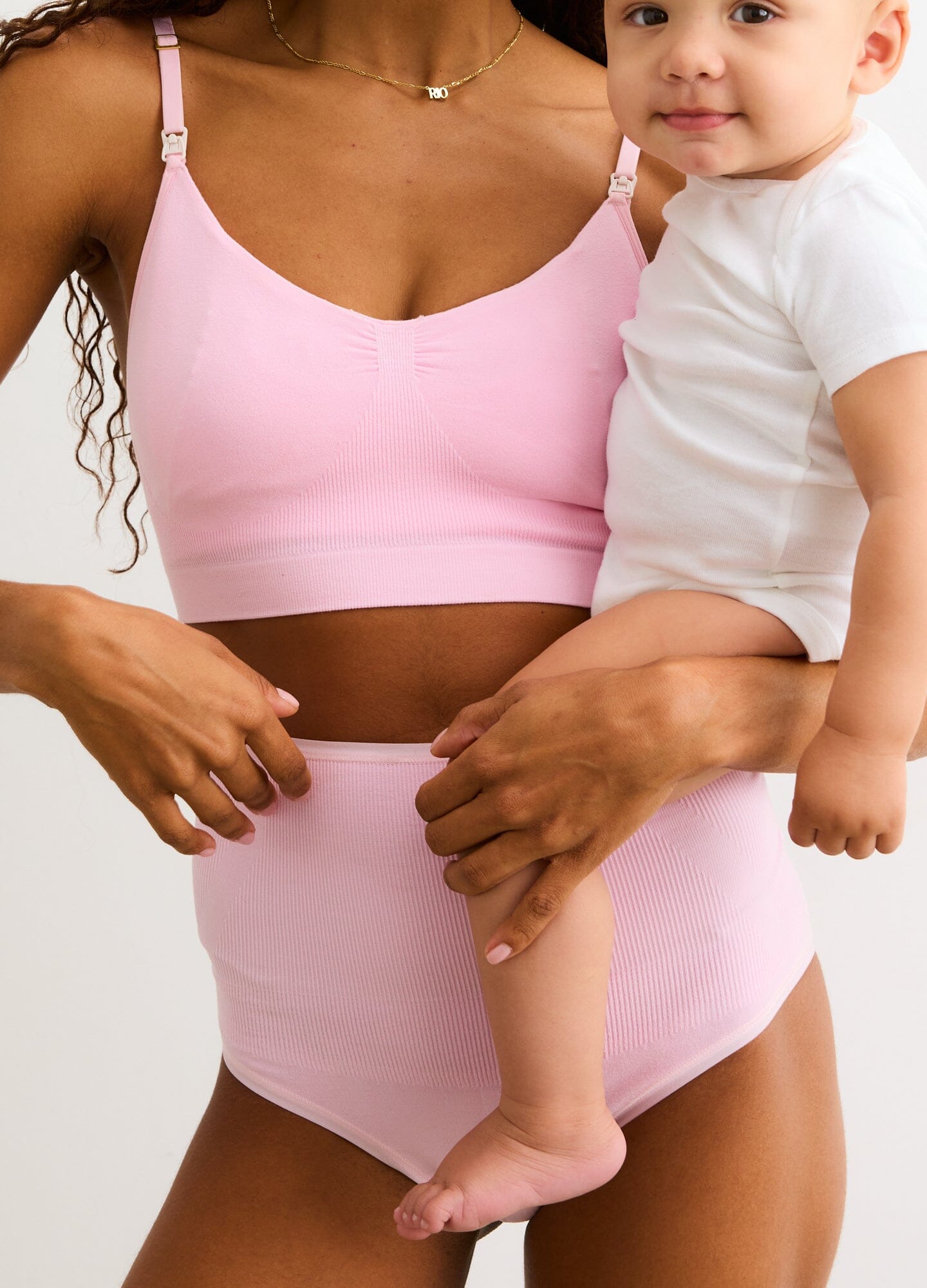 The Seamless Belly Brief - Soft pink seamless maternity brief with high waist for pregnancy and postpartum comfort.