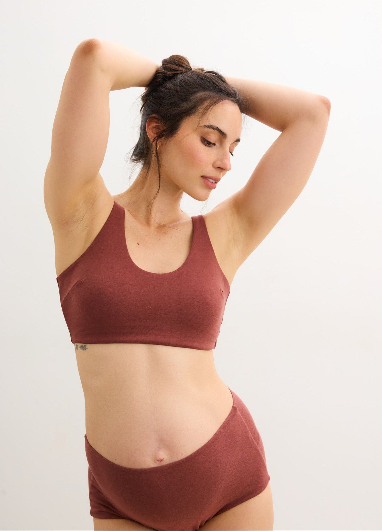 The Skin To Skin Bra - Soft anise-colored maternity bra with wide straps designed for nursing and postpartum comfort.