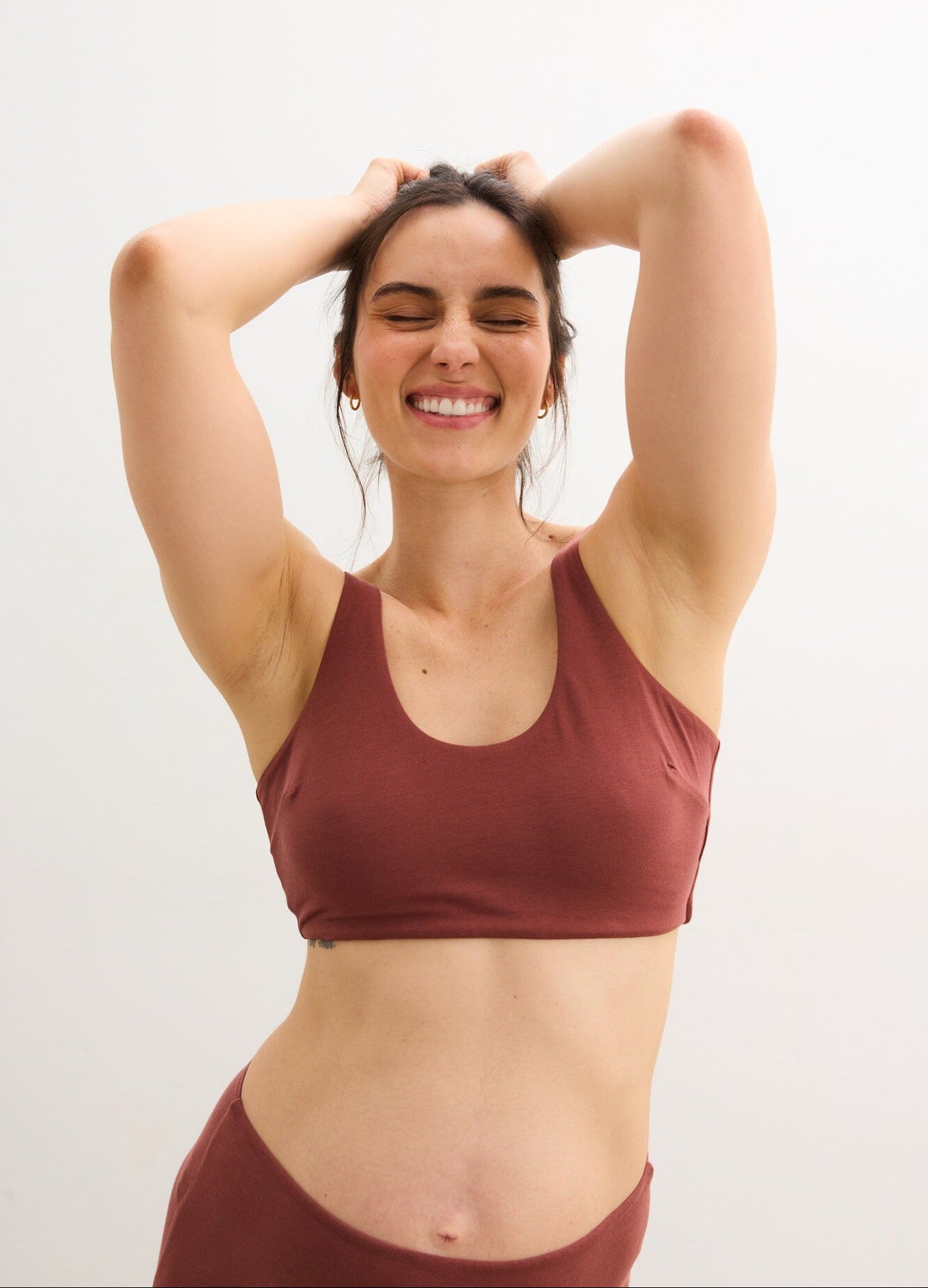 The Skin To Skin Bra - Soft anise-colored maternity bra with wide straps designed for nursing and postpartum comfort.