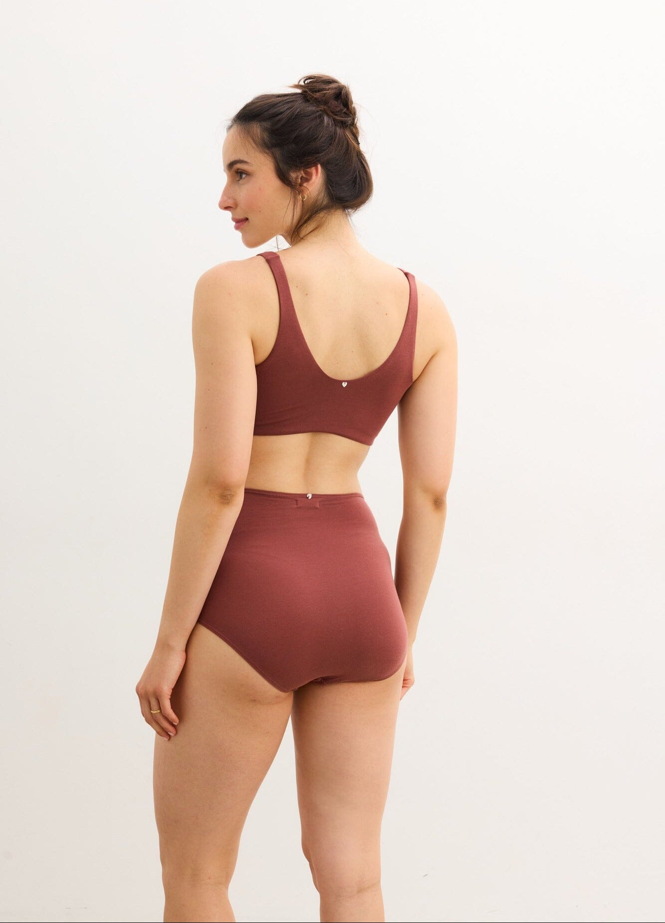 The Skin To Skin Bra - Soft anise-colored maternity bra with wide straps designed for nursing and postpartum comfort.