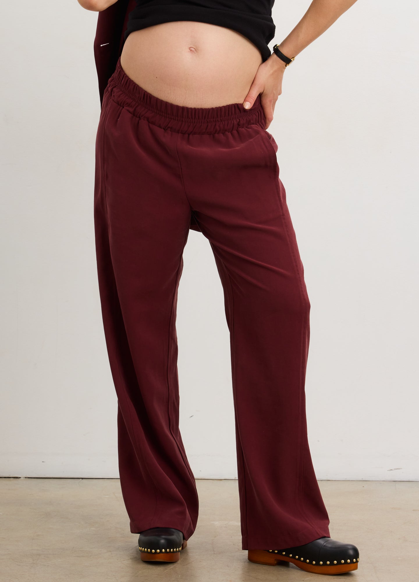 The Soft Tailored Pull On Trouser - Chocolate plum soft tailored maternity pull-on trousers with straight leg, paired with matching double-breasted blazer for.