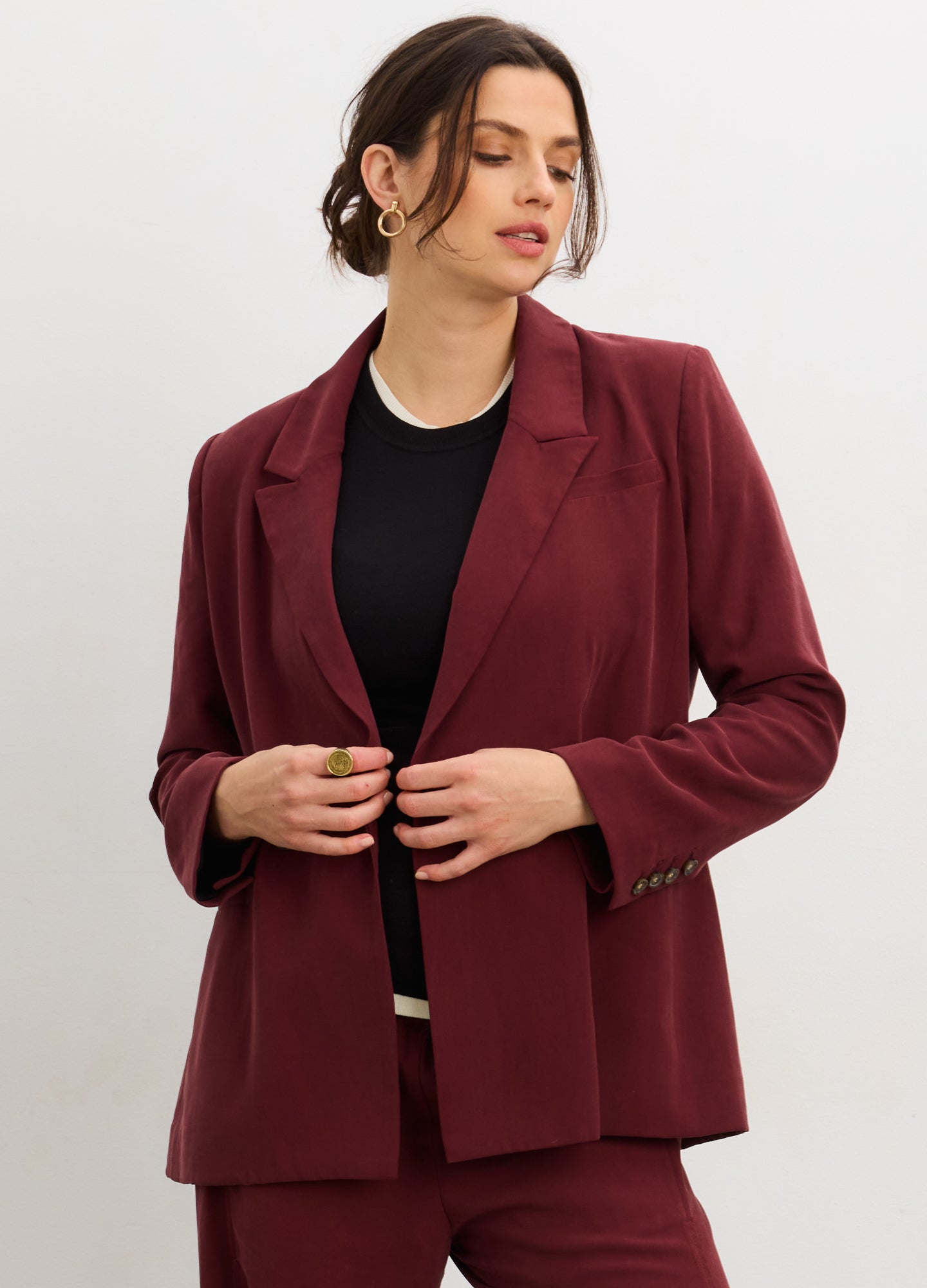 The Soft Tailored Twill Blazer - Chocolate plum maternity blazer with tailored fit, lapel collar, front flap pockets, designed for pregnancy, nursing, and.