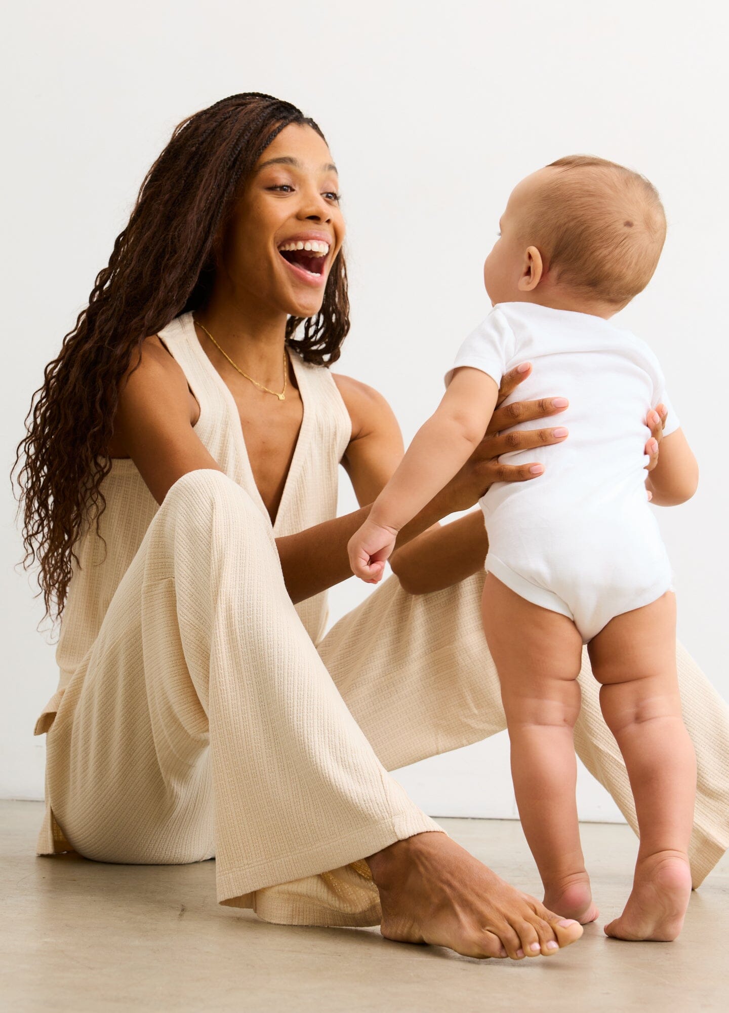 The Silky Ribbed Pointelle Easy Pant - Sand ribbed maternity pants with a relaxed fit, designed for pregnancy, nursing, and postpartum comfort.
