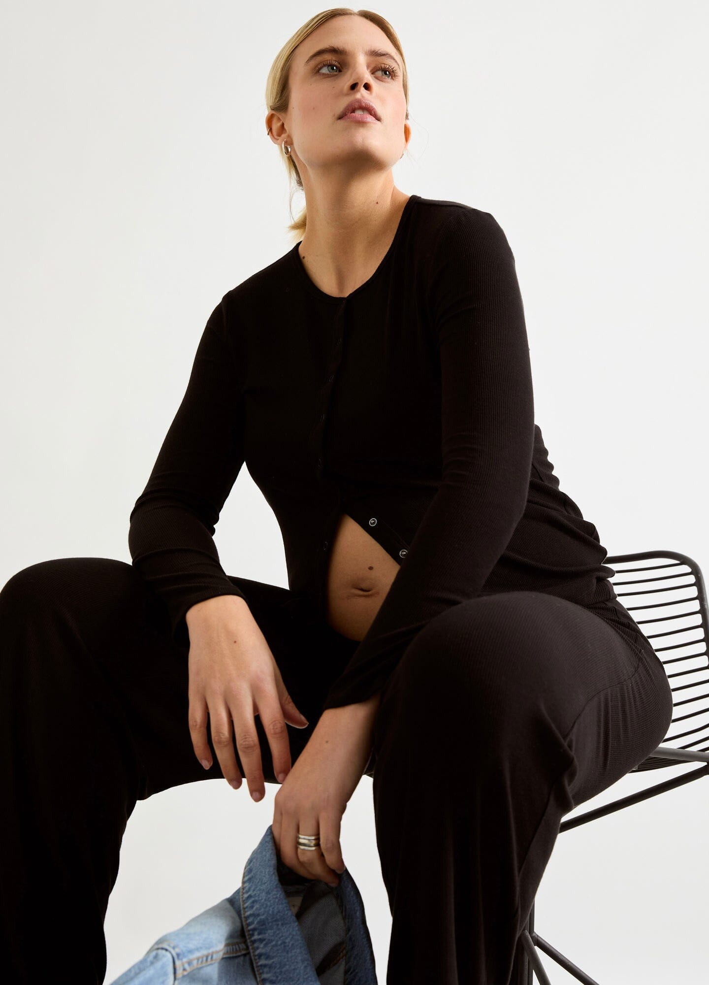 The Softest Rib Nursing Cardigan - Black soft rib-knit nursing cardigan with front buttons, designed for maternity, nursing, and postpartum comfort.