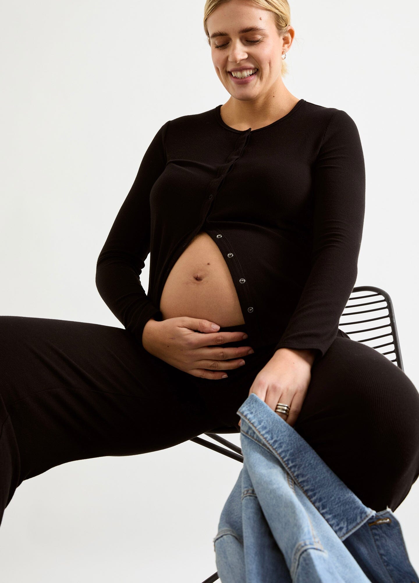 The Softest Rib Nursing Cardigan - Black soft rib-knit nursing cardigan with front buttons, designed for maternity, nursing, and postpartum comfort.