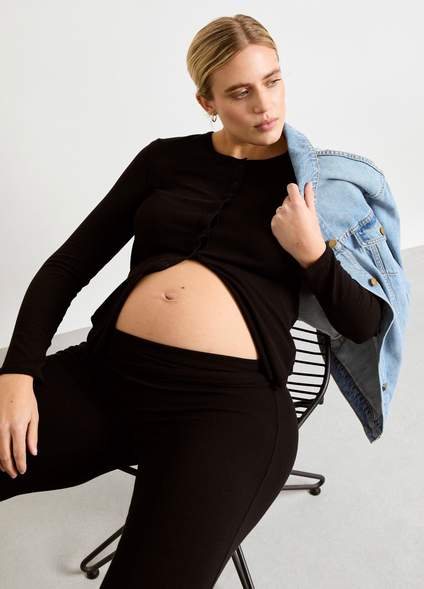 The Softest Rib Nursing Cardigan - Black soft rib-knit nursing cardigan with front buttons, designed for maternity, nursing, and postpartum comfort.