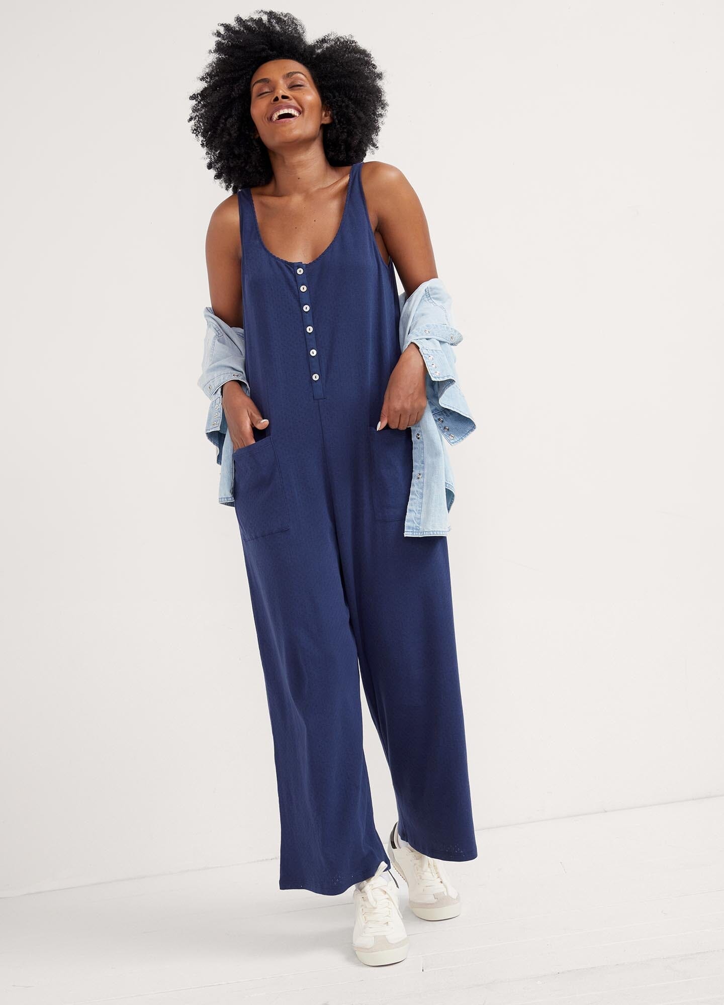 The 24/7 Feeding Jumpsuit POS - Lilac maternity jumpsuit with sleeveless V-neck, nursing-friendly front buttons, and wide-leg fit for postpartum comfort.