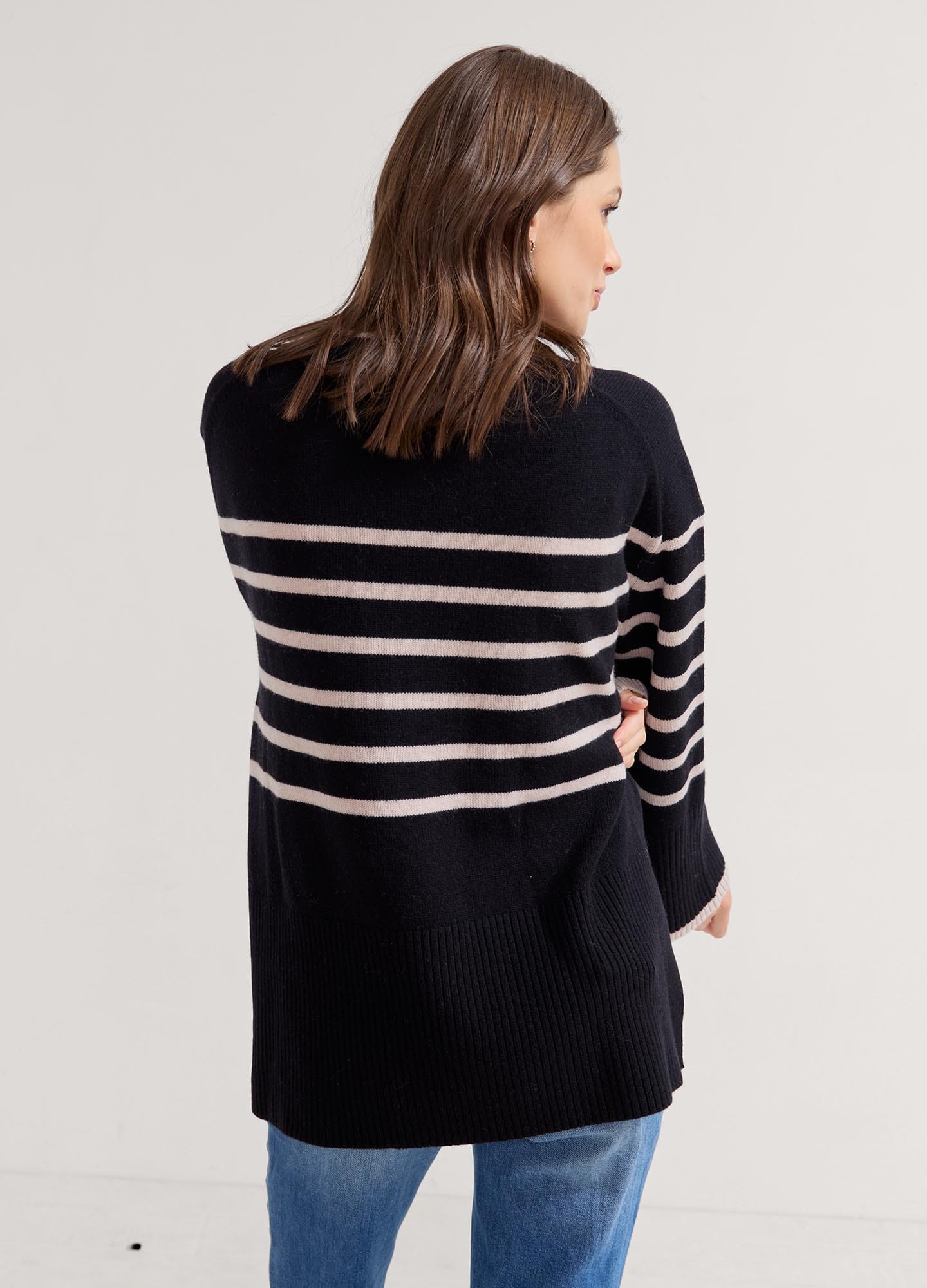 The Carly Knit Pullover - Black and oat melange striped knit pullover with side slits, designed for maternity, nursing, and postpartum comfort.