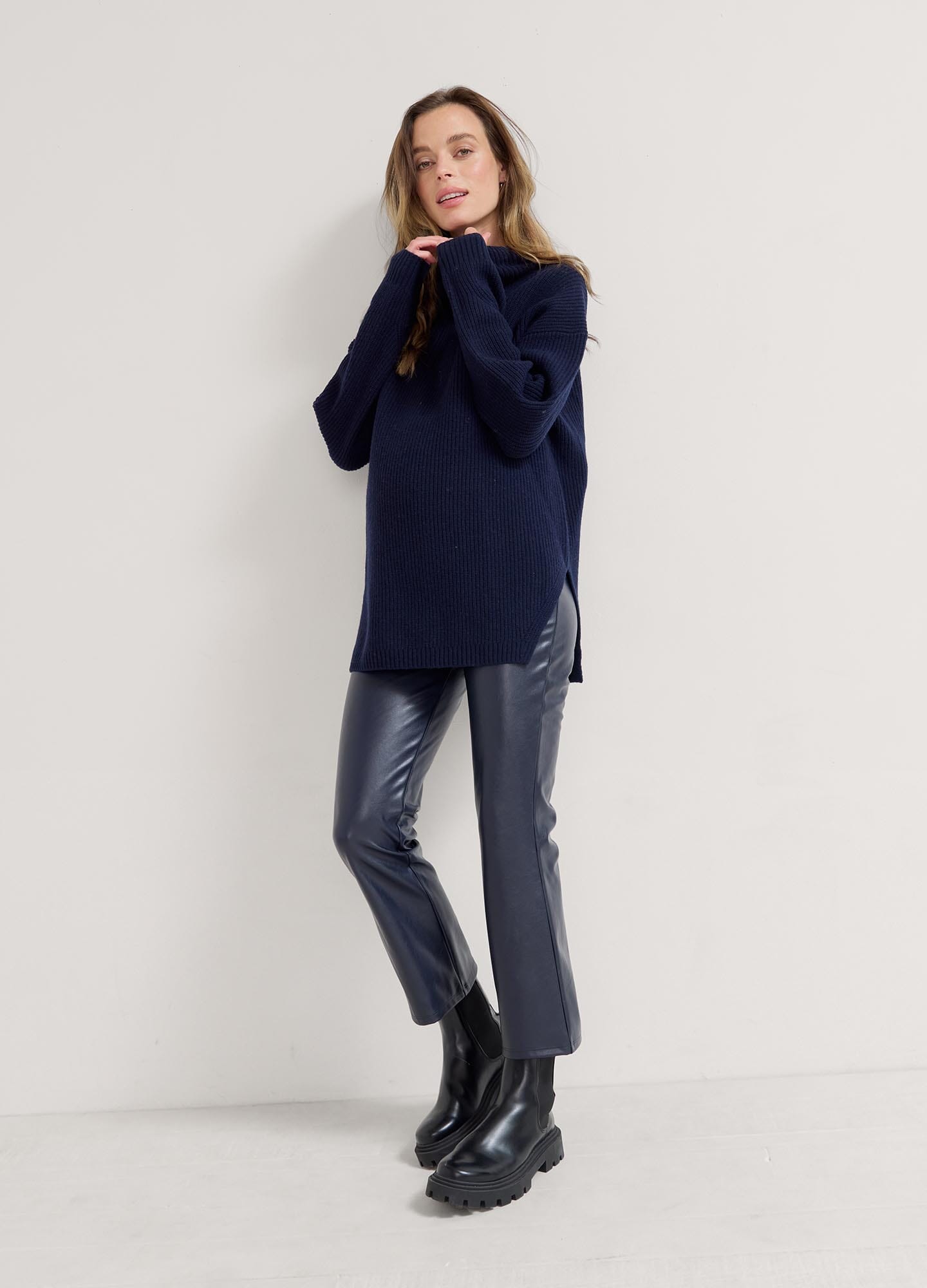 The Cozy Shaker Turtleneck - Navy blue cozy maternity turtleneck sweater with long sleeves, designed for nursing and postpartum comfort.