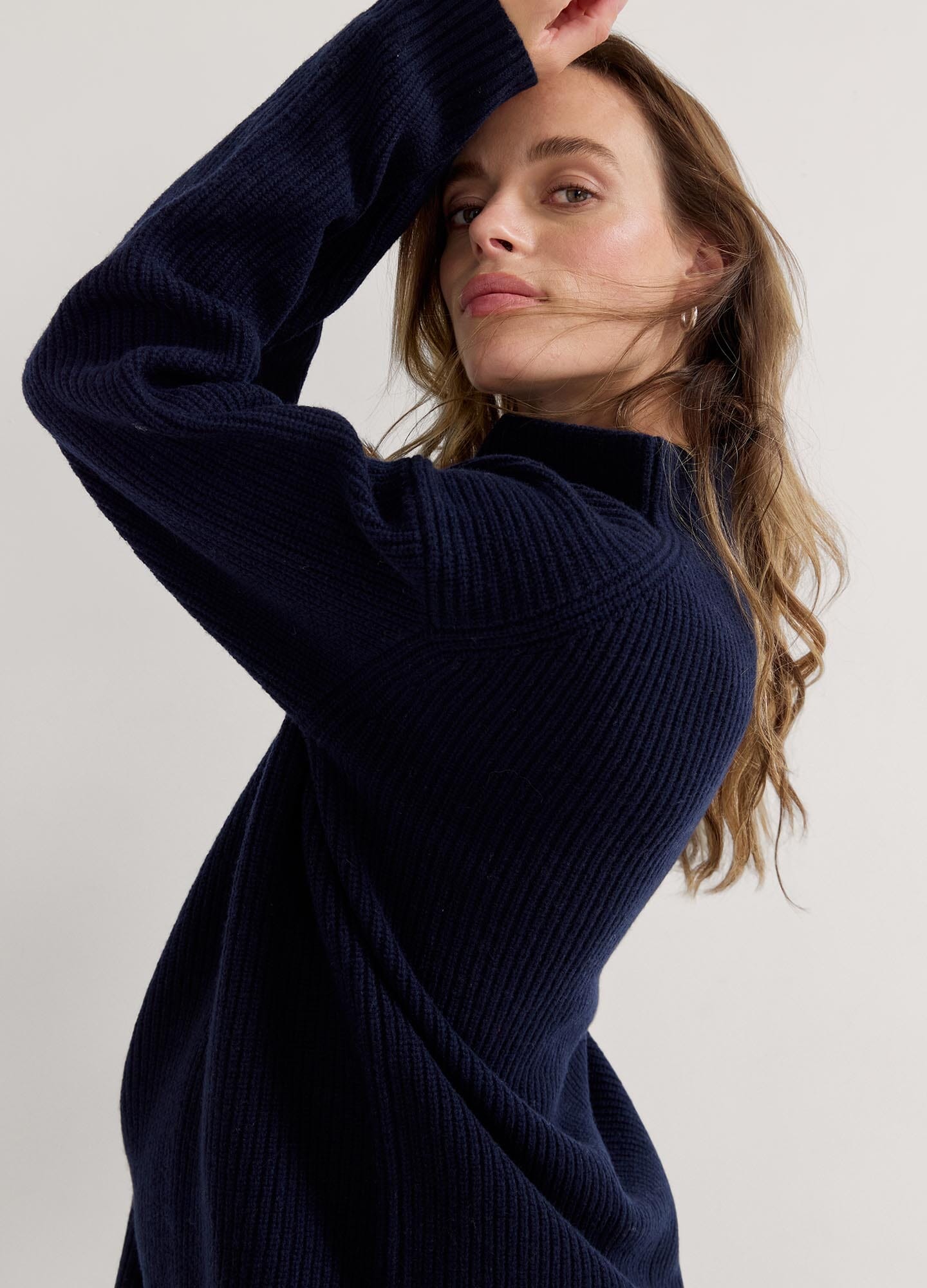 The Cozy Shaker Turtleneck - Navy blue cozy maternity turtleneck sweater with long sleeves, designed for nursing and postpartum comfort.