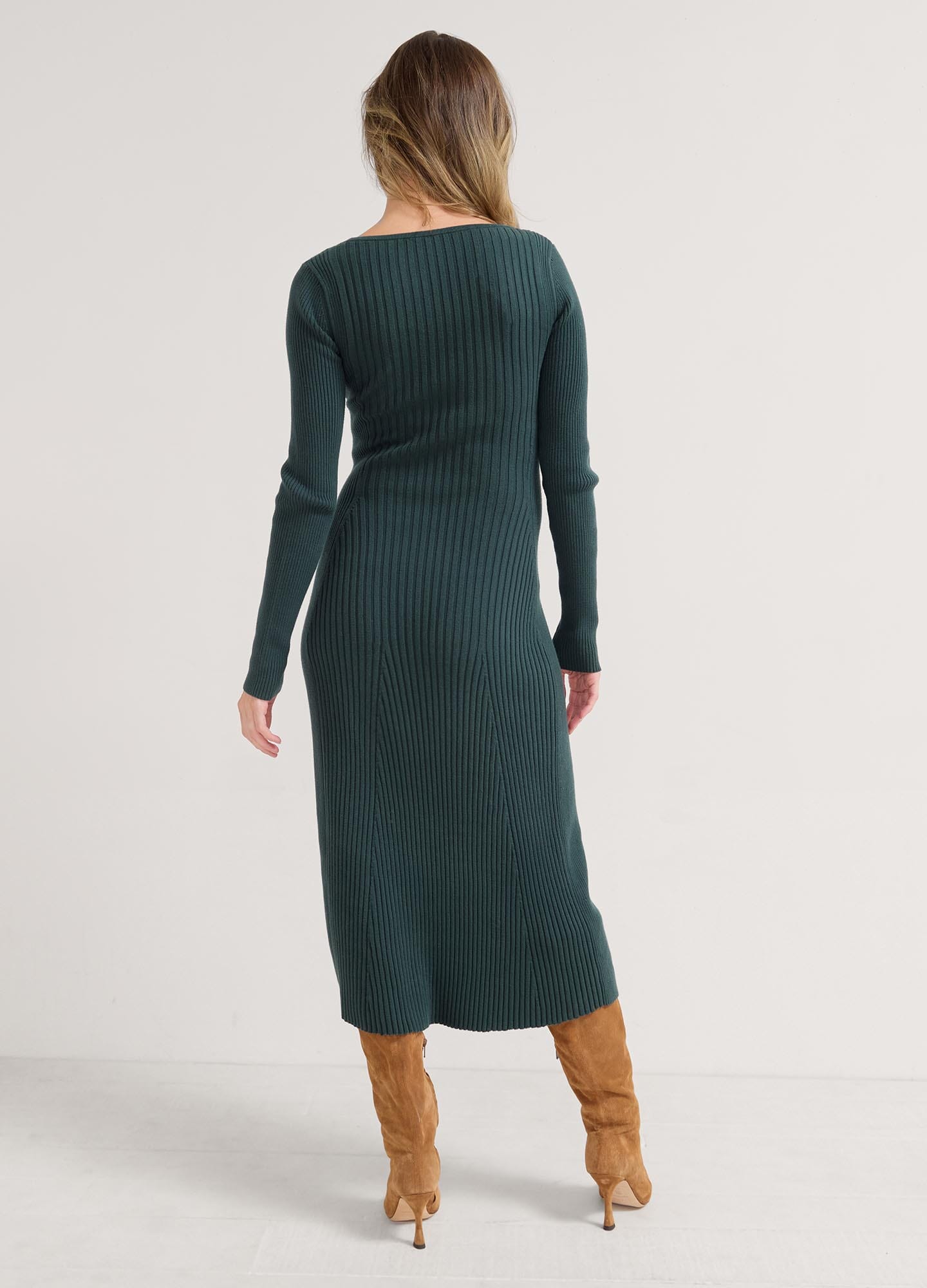 The Dasha Sweater Dress - Long-sleeve pine green ribbed maternity sweater dress with V-neck, fitted for pregnancy and postpartum nursing.