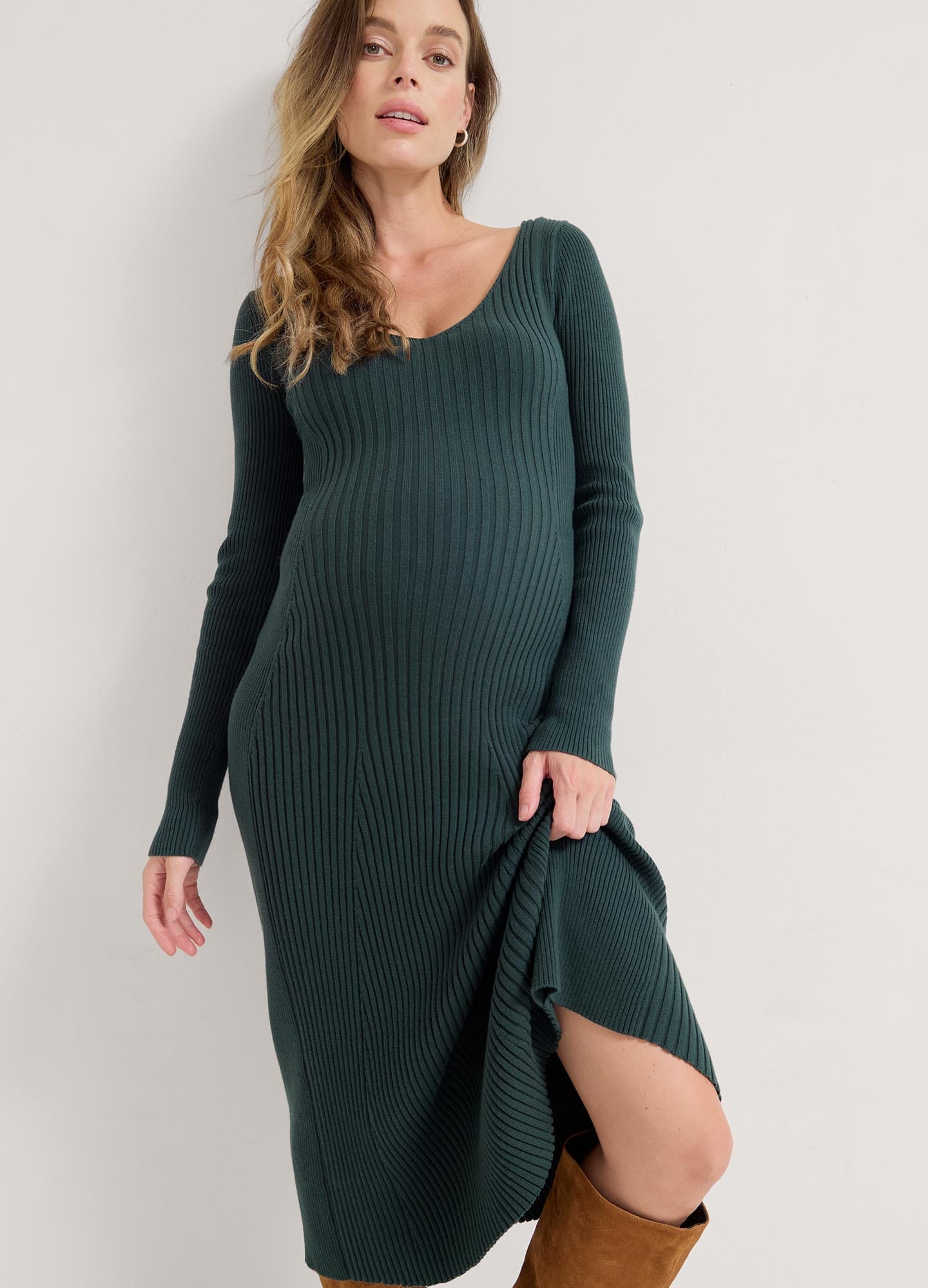 The Dasha Sweater Dress - Long-sleeve pine green ribbed maternity sweater dress with V-neck, fitted for pregnancy and postpartum nursing.