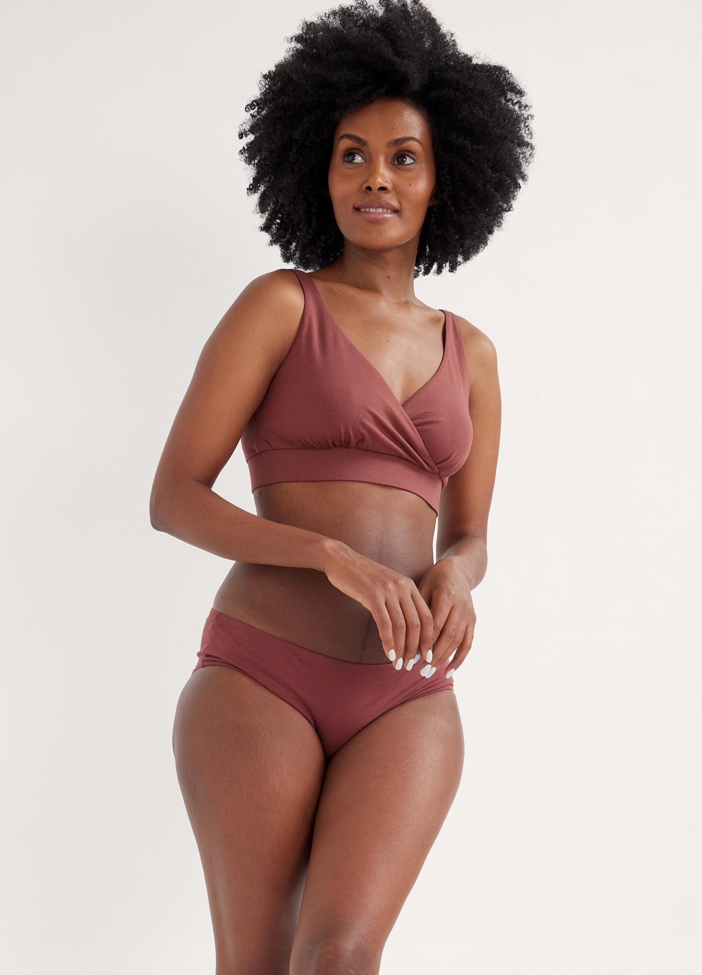 The Dream Feed Nursing And Sleep Bra - Soft, stretchy anise maternity nursing bra with easy-access clips, modeled during postpartum and nursing moments.