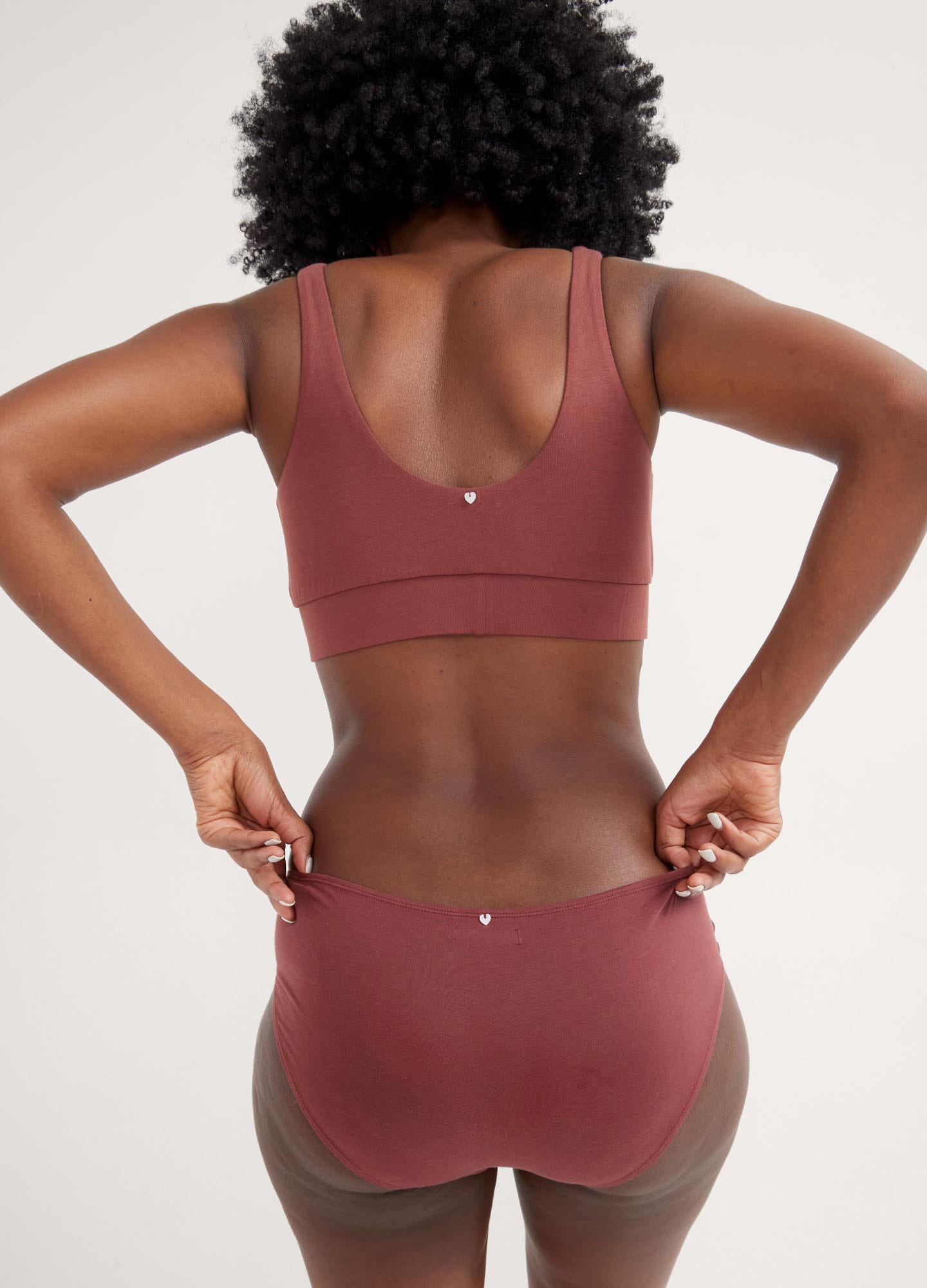 The Dream Feed Nursing And Sleep Bra - Soft, stretchy anise maternity nursing bra with easy-access clips, modeled during postpartum and nursing moments.