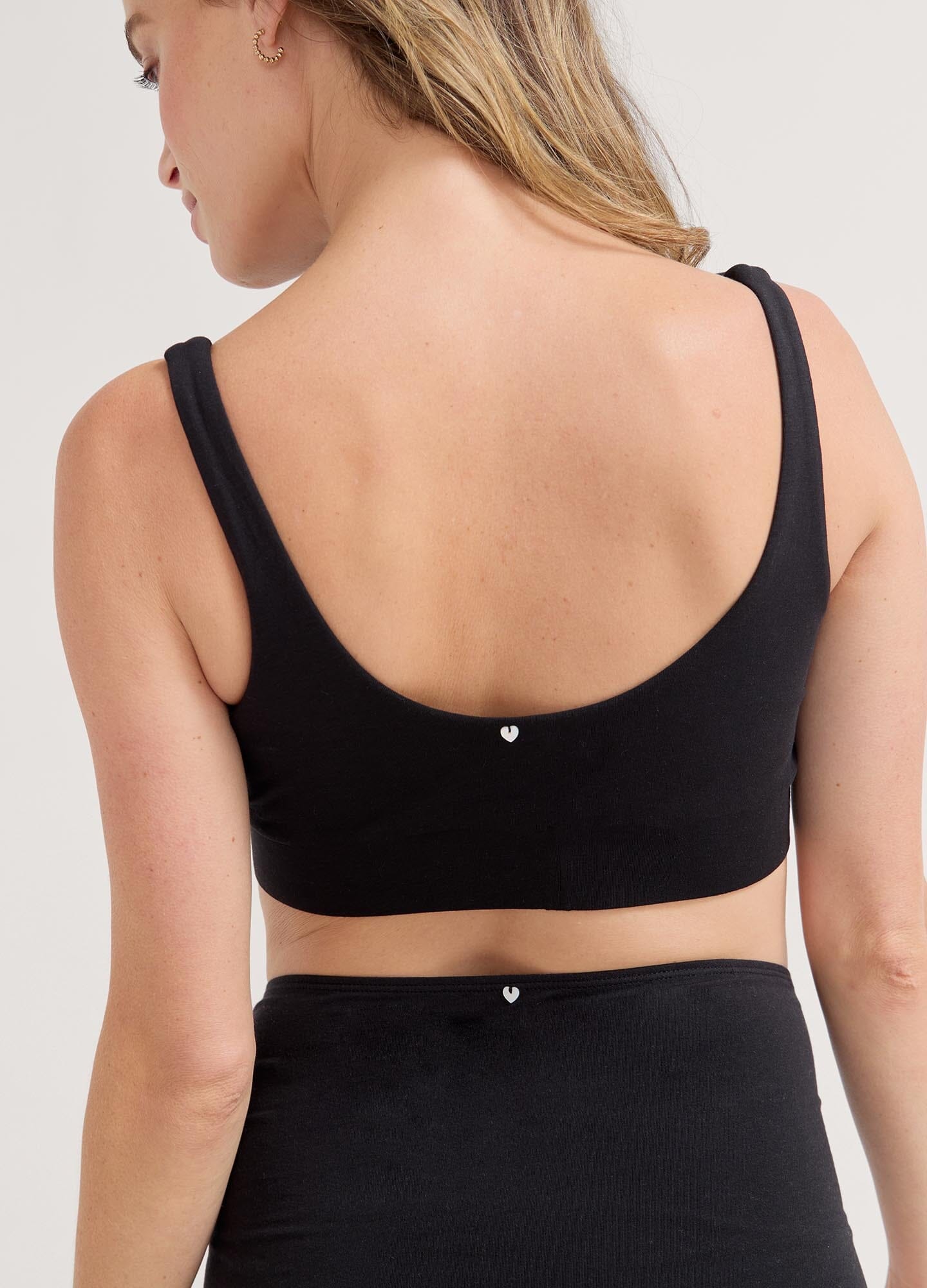 The Dream Feed Nursing And Sleep Bra - Soft pink maternity nursing bra with ditsy wildflower print, designed for pregnancy and postpartum comfort.