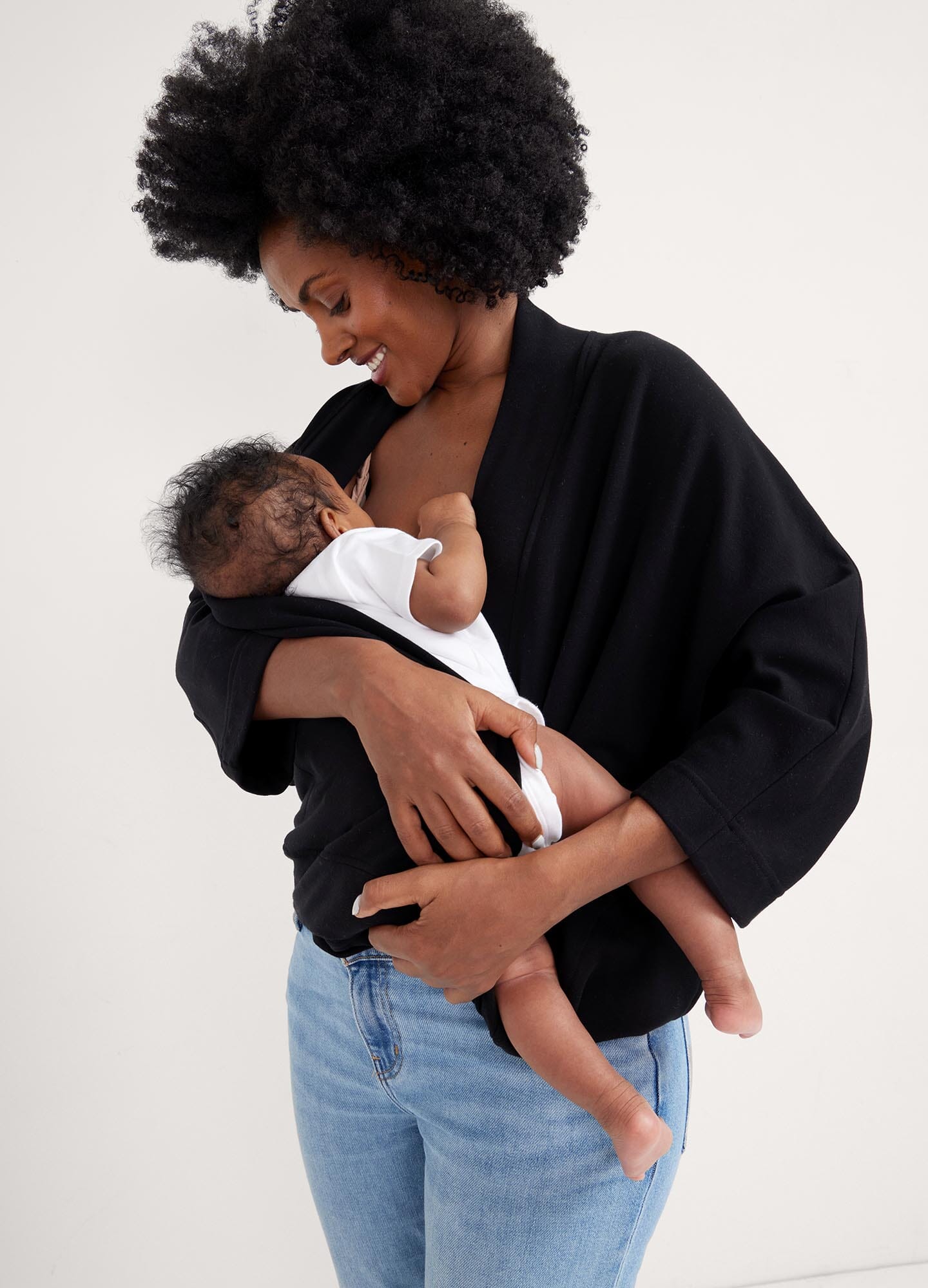 The Early Days Nursing Sweatshirt - Black maternity nursing sweatshirt with crossover front and relaxed fit, styled for postpartum comfort.