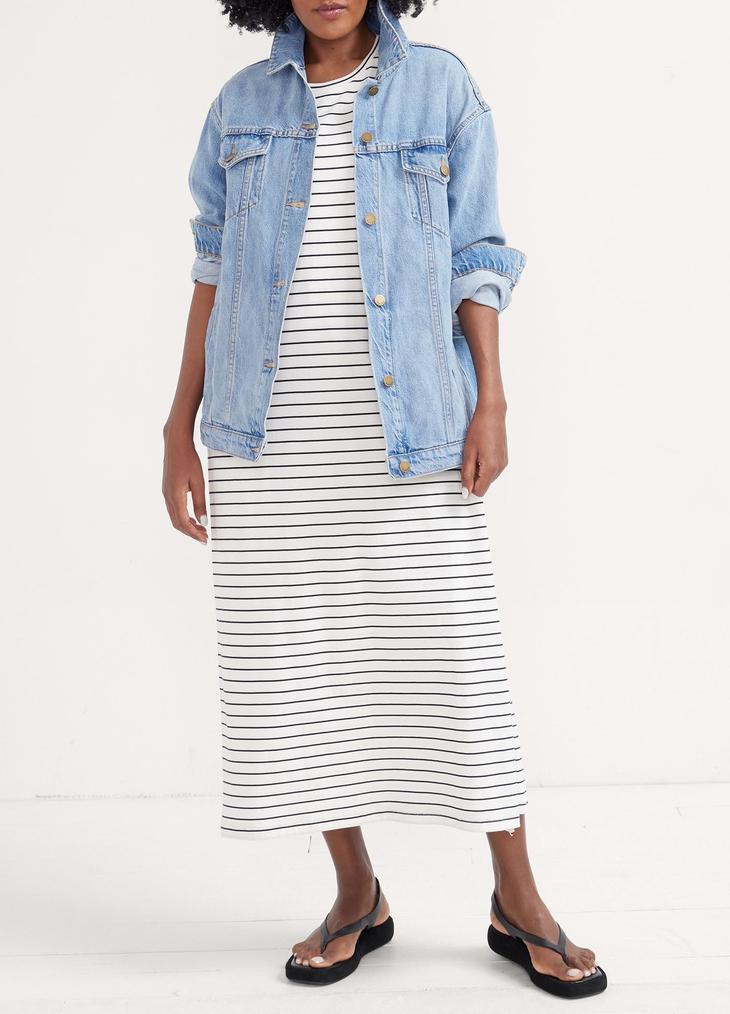 The Easy Going Nursing Tee Dress - Black and white striped nursing tee dress with short sleeves, designed for maternity, pregnancy, and postpartum comfort.