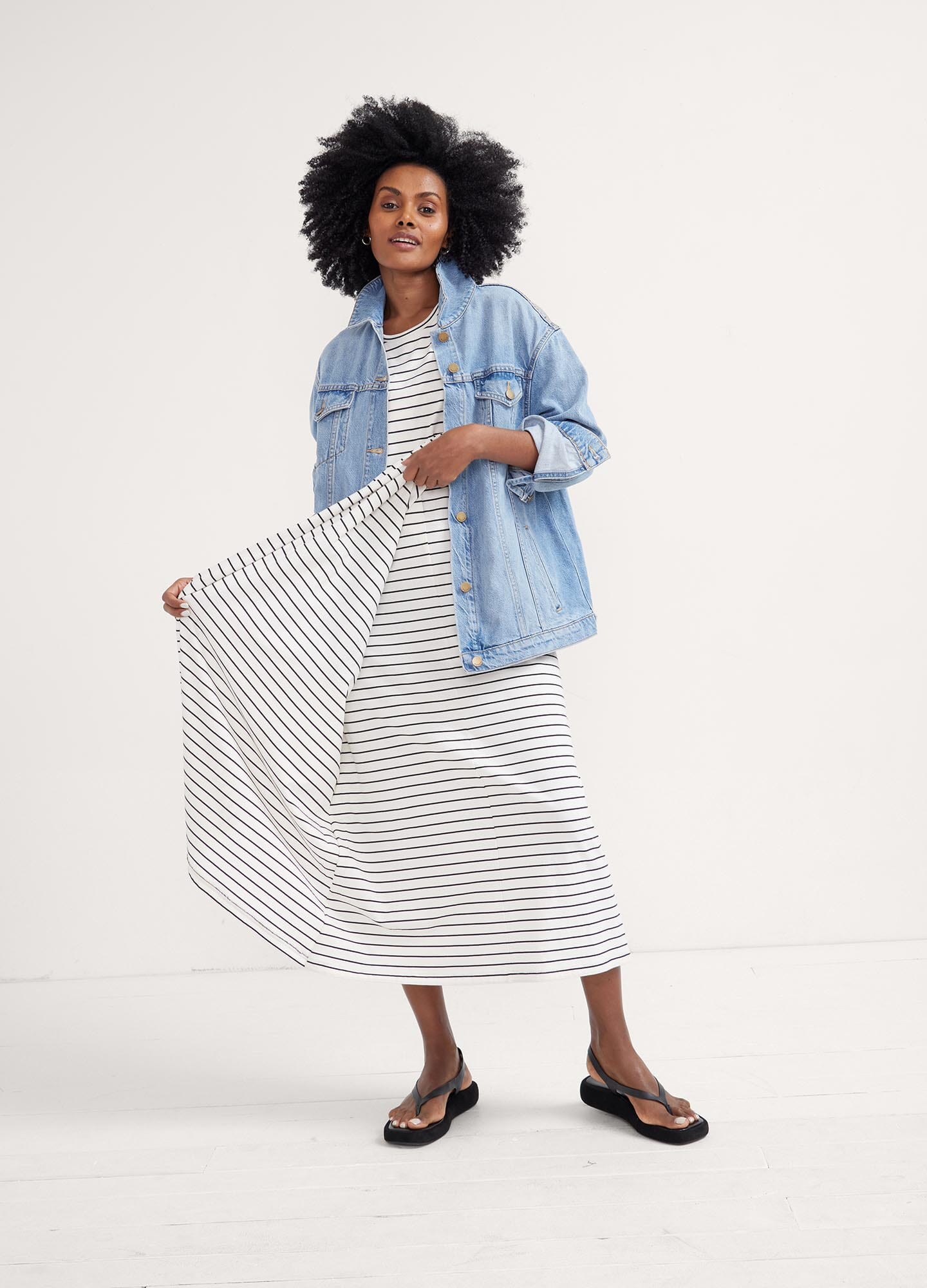 The Easy Going Nursing Tee Dress - Black and white striped nursing tee dress with short sleeves, designed for maternity, pregnancy, and postpartum comfort.