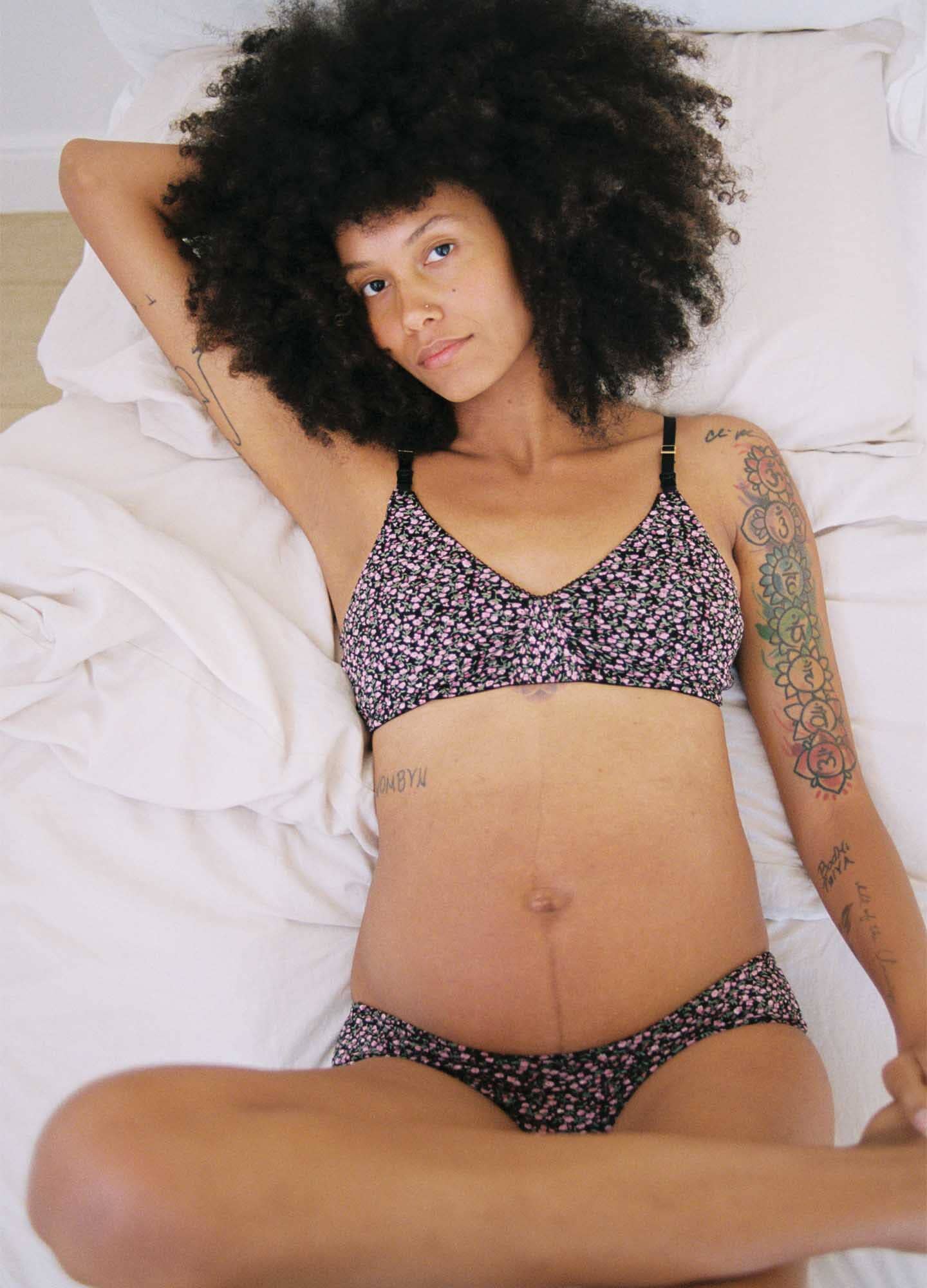 The Everyday Nursing Bra POS - Cream petite rosette nursing bra with adjustable straps designed for maternity, pregnancy, and postpartum comfort.