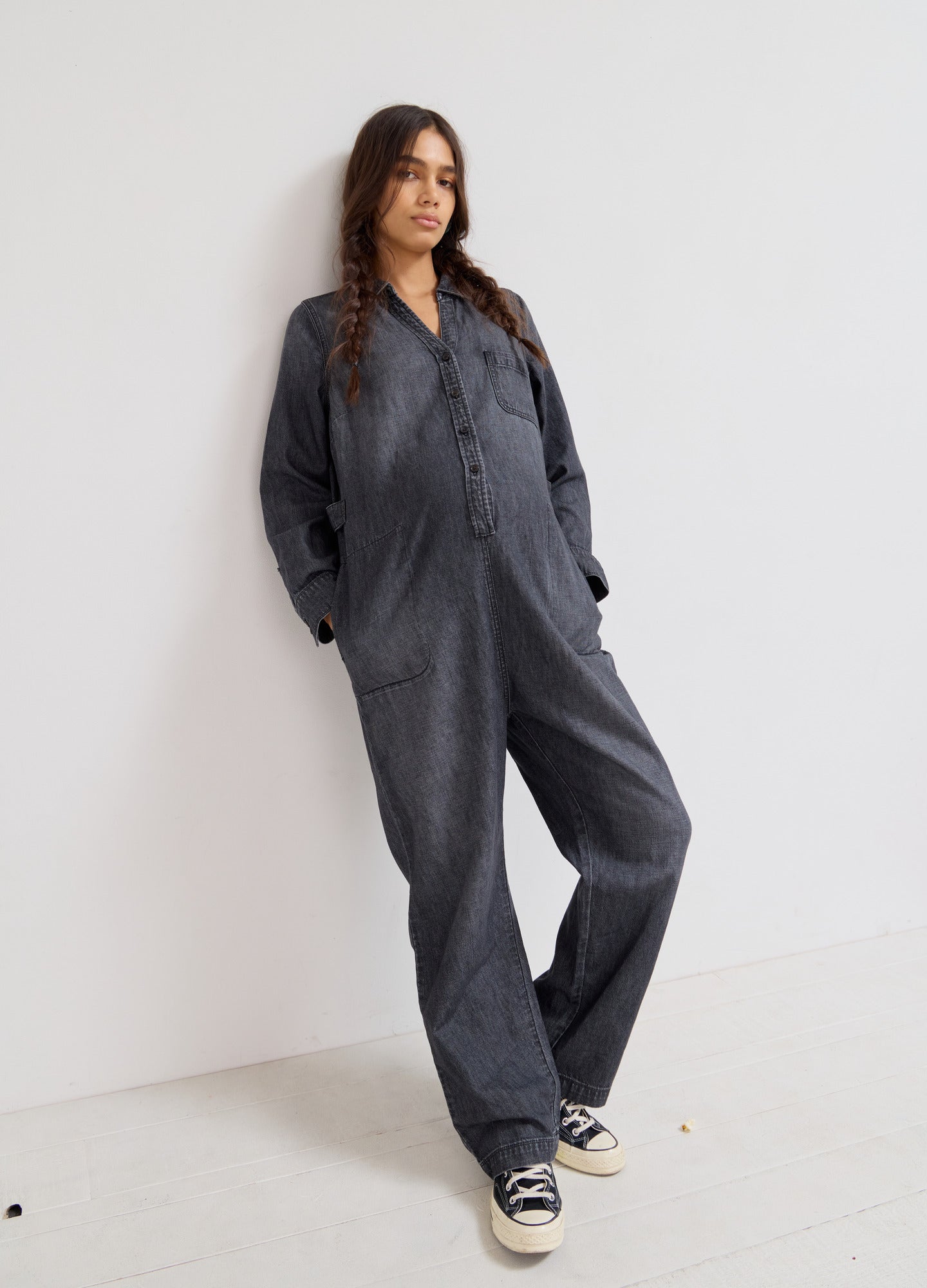 The Everyday Nursing Denim Jumpsuit - Washed black denim maternity jumpsuit with front buttons, long sleeves, and relaxed fit for nursing and postpartum.