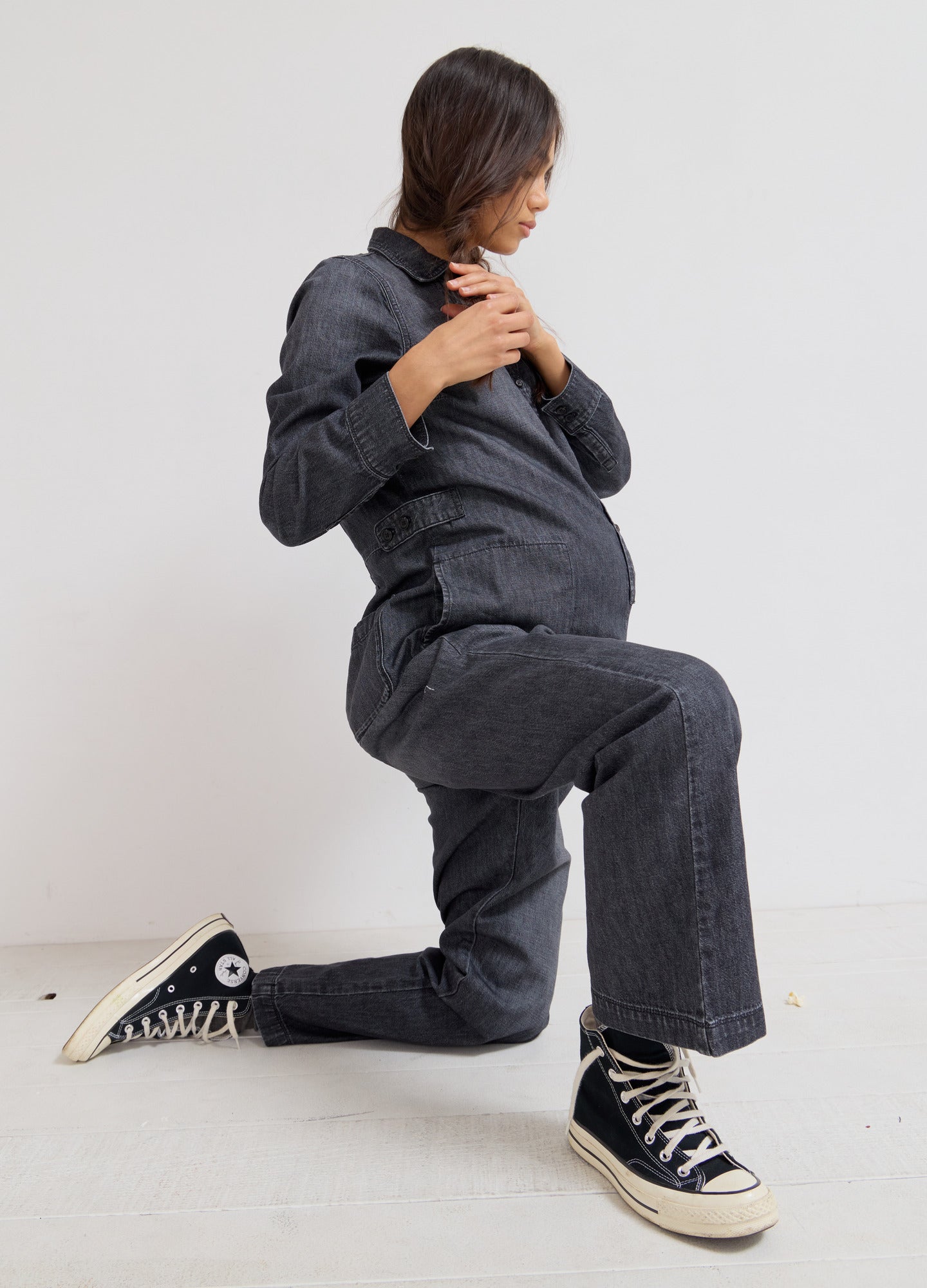 The Everyday Nursing Denim Jumpsuit - Washed black denim maternity jumpsuit with front buttons, long sleeves, and relaxed fit for nursing and postpartum.