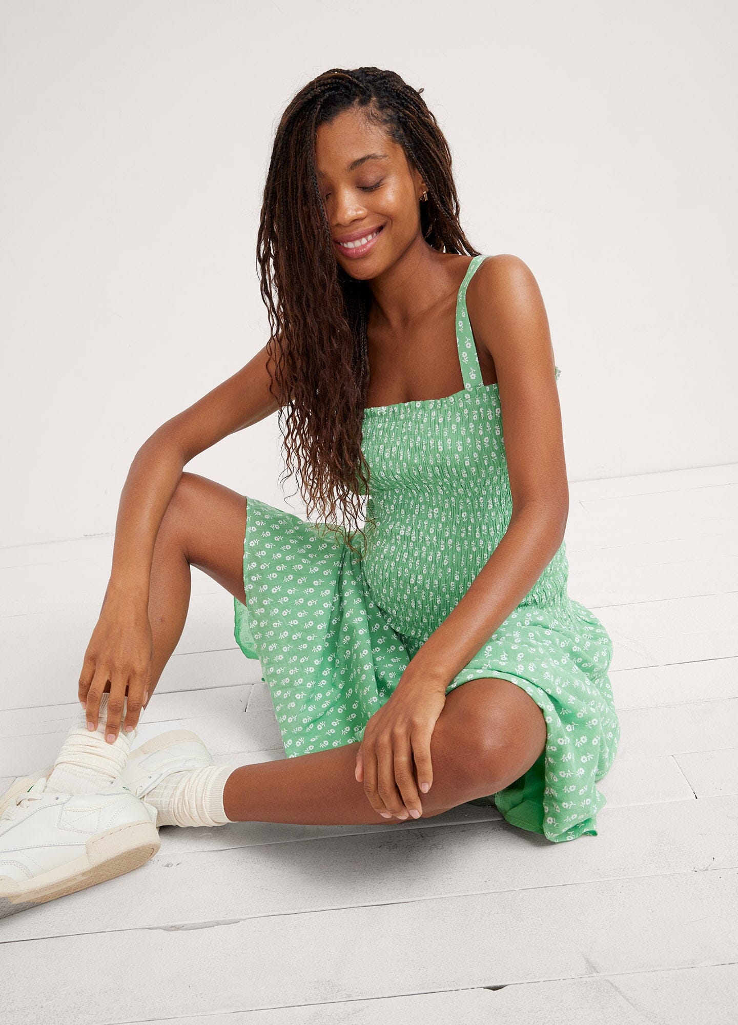 The Evie Dress - Green ditsy batik maternity dress with adjustable straps and smocked bust for pregnancy, nursing, and postpartum comfort.