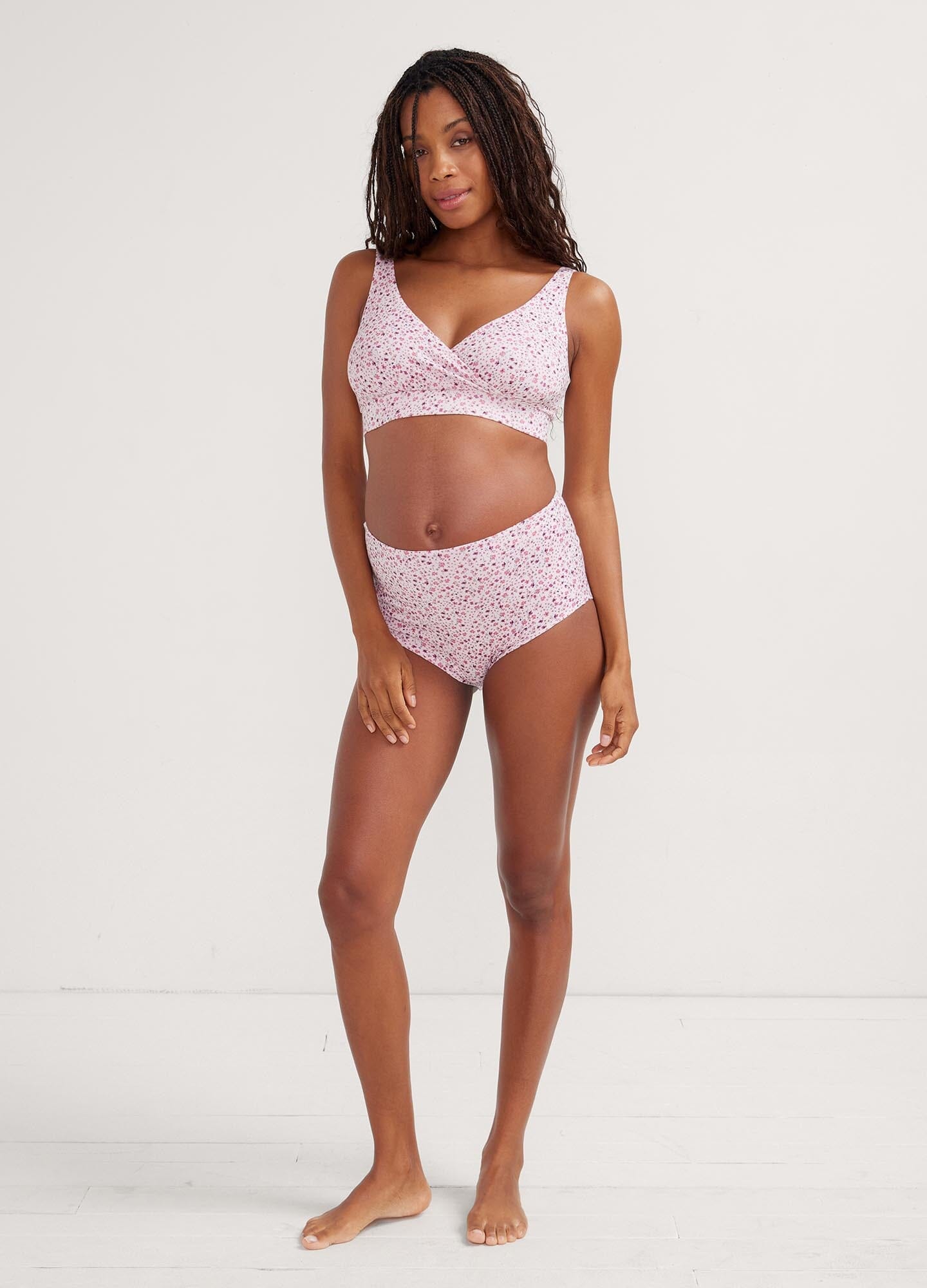 The High Tuck Brief POS - Navy rosette maternity high tuck briefs with full coverage, modeled for pregnancy and postpartum comfort.